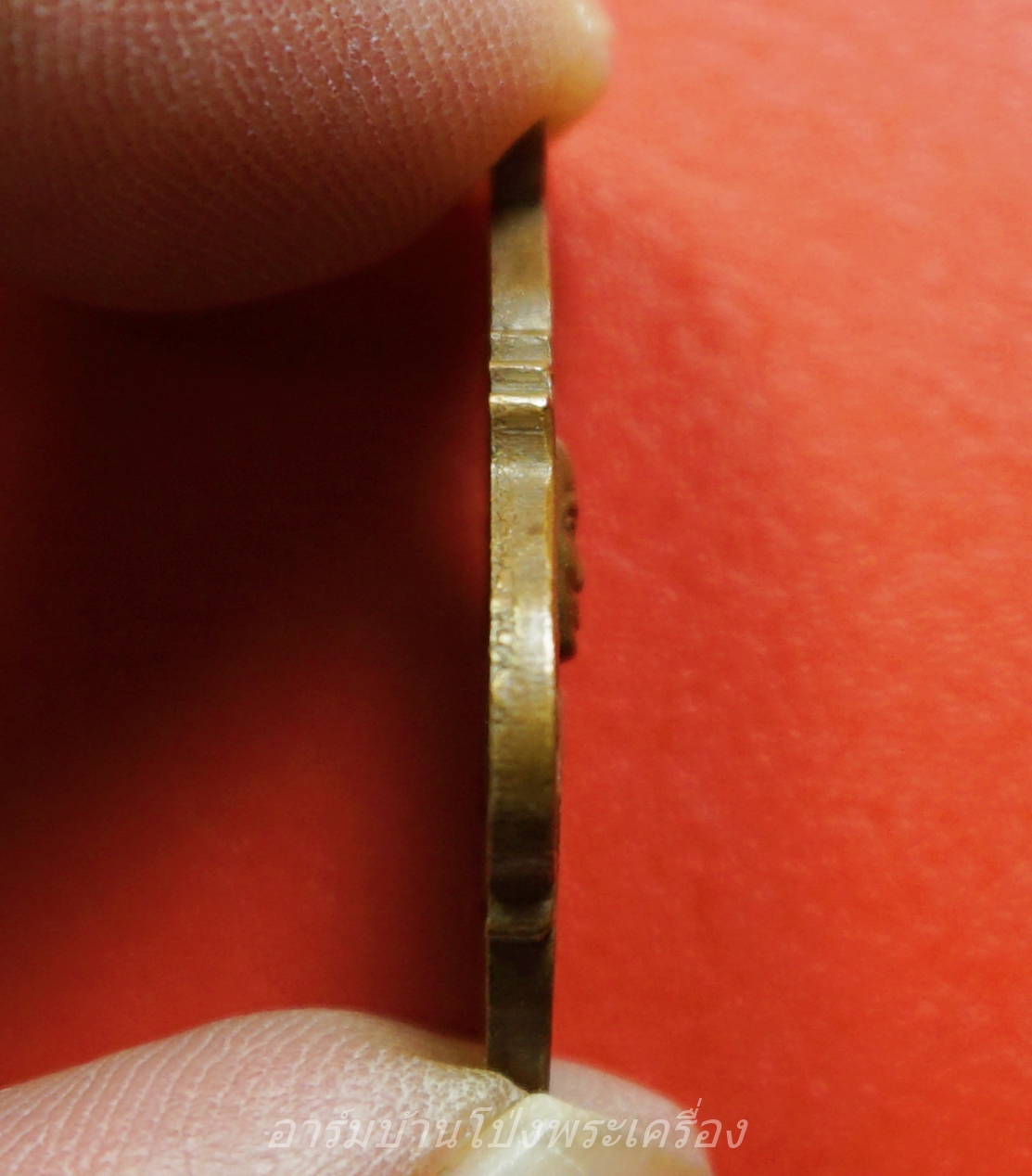 หลวงปู่จ้อย วัดบางช้างเหนือ เหรียญปาดตาล ปี๒๕๕๘ เนื้อทองแดง(องค์ที่1)