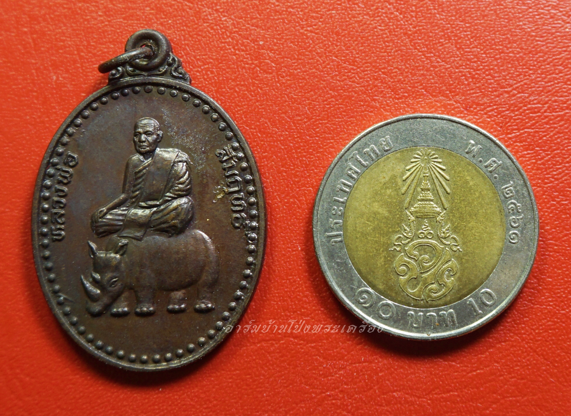 หลวงพ่อสัมฤทธิ์ วัดถ้ำแฝด รุ่นนำโชค เนื้อทองแดงรมดำ(องค์ที่3)