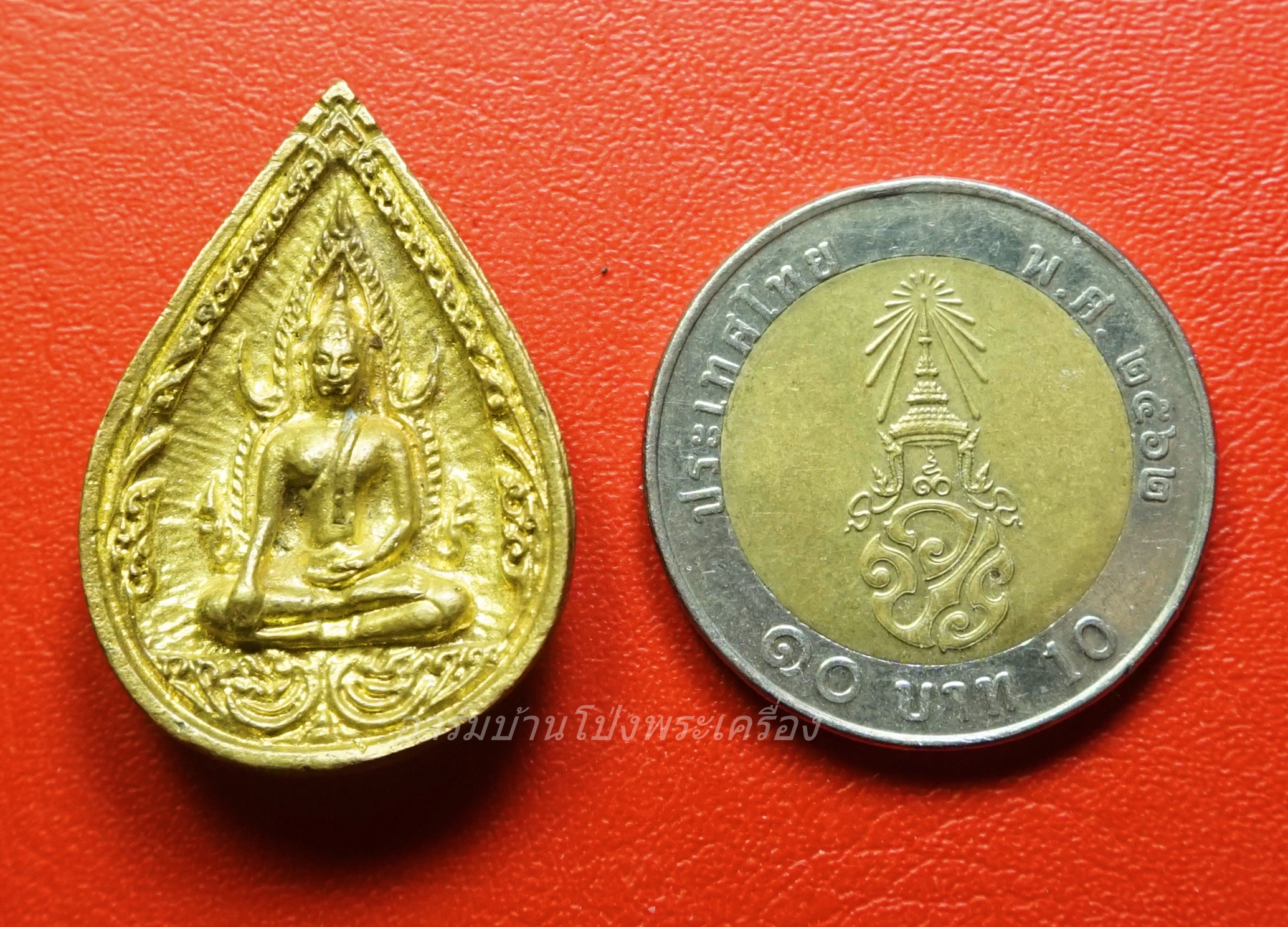 หลวงพ่อแพ วัดพิกุลทอง จ.สิงห์บุรี เหรียญหล่อพระพุทธชินราช รุ่นแพพันล้าน ปี๒๕๓๙ เนื้อทองเหลือง(องค์ที่1)