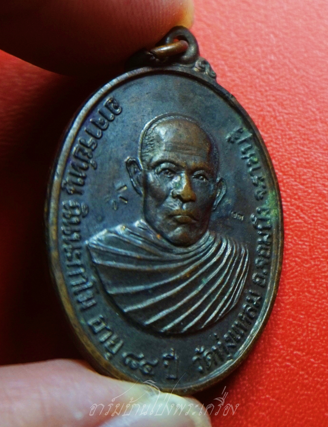 หลวงปู่หนู วัดทุ่งแหลม รุ่นอายุ๘๔ปี ปี๒๕๒๓ ตอกโค๊ตดอกจันทร์และเลข๒๓ เนื้อทองแดงรมดำ(องค์ที่1)