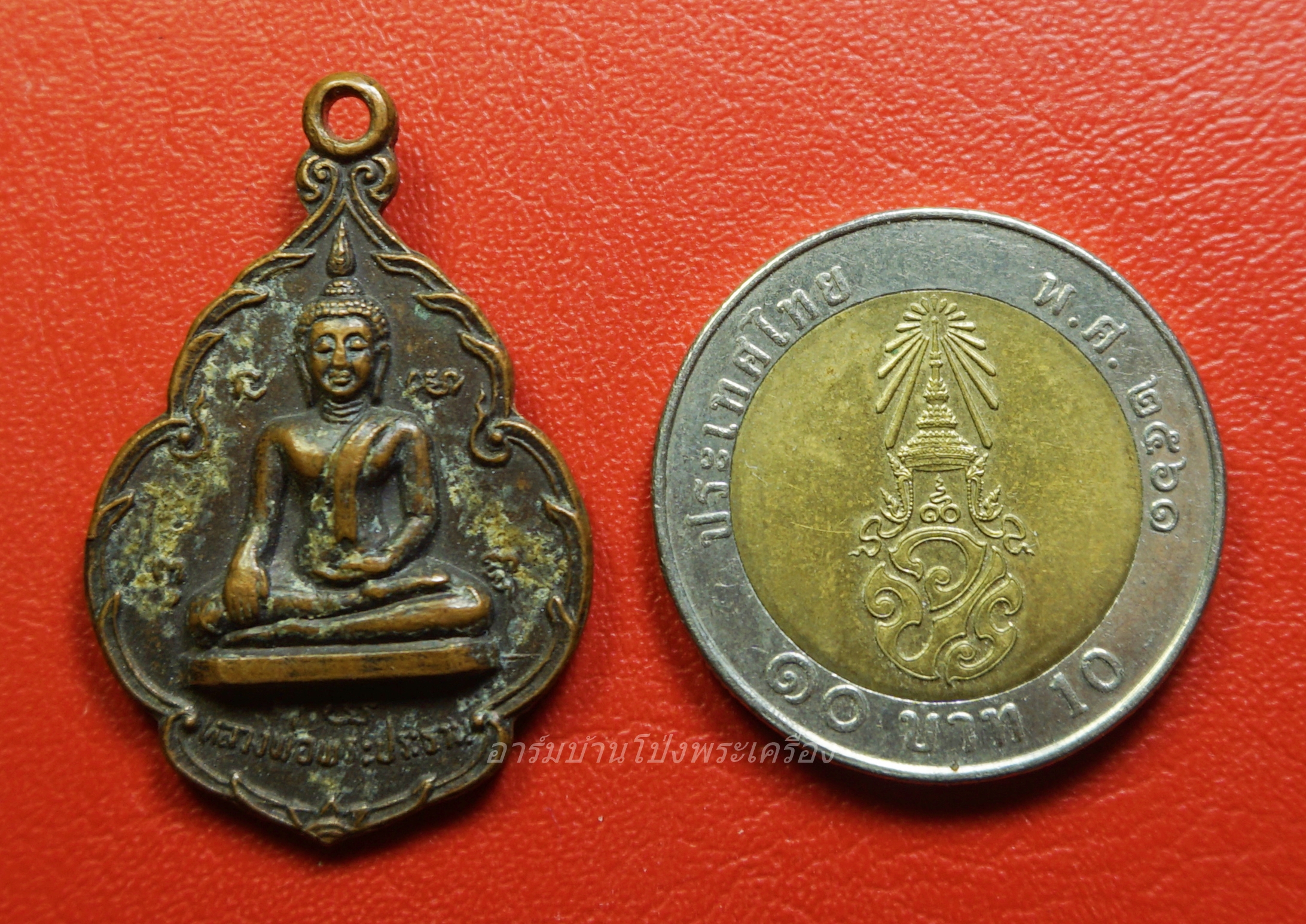 หลวงพ่อปุย วัดแก้มอ้น รุ่น๑ สร้างอุโบสถ เนื้อทองแดงรมดำ(องค์ที่1)