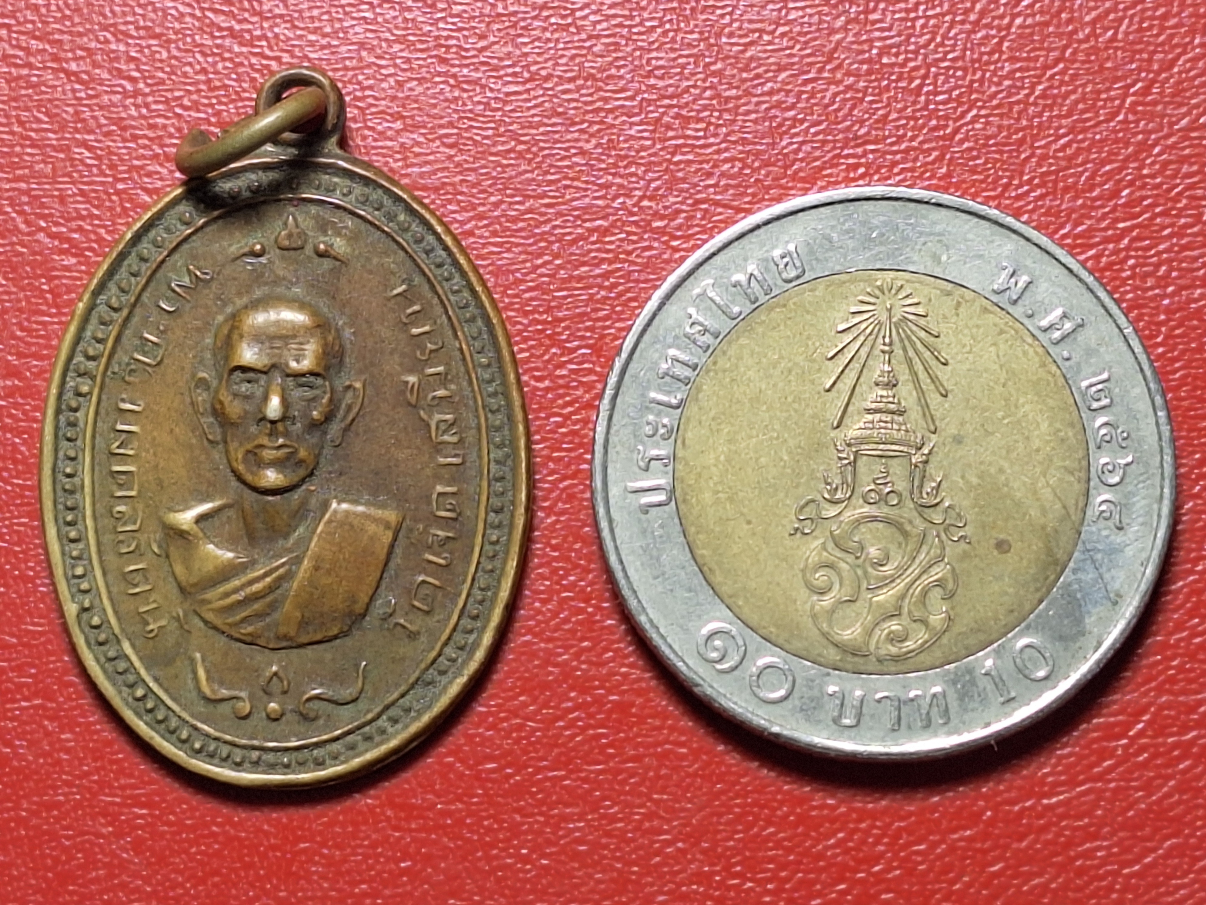 หลวงพ่อหุ่น วัดเจ็ดเสมียน รุ่นแรก เนื้ออัลปาก้า(องค์ที่3)