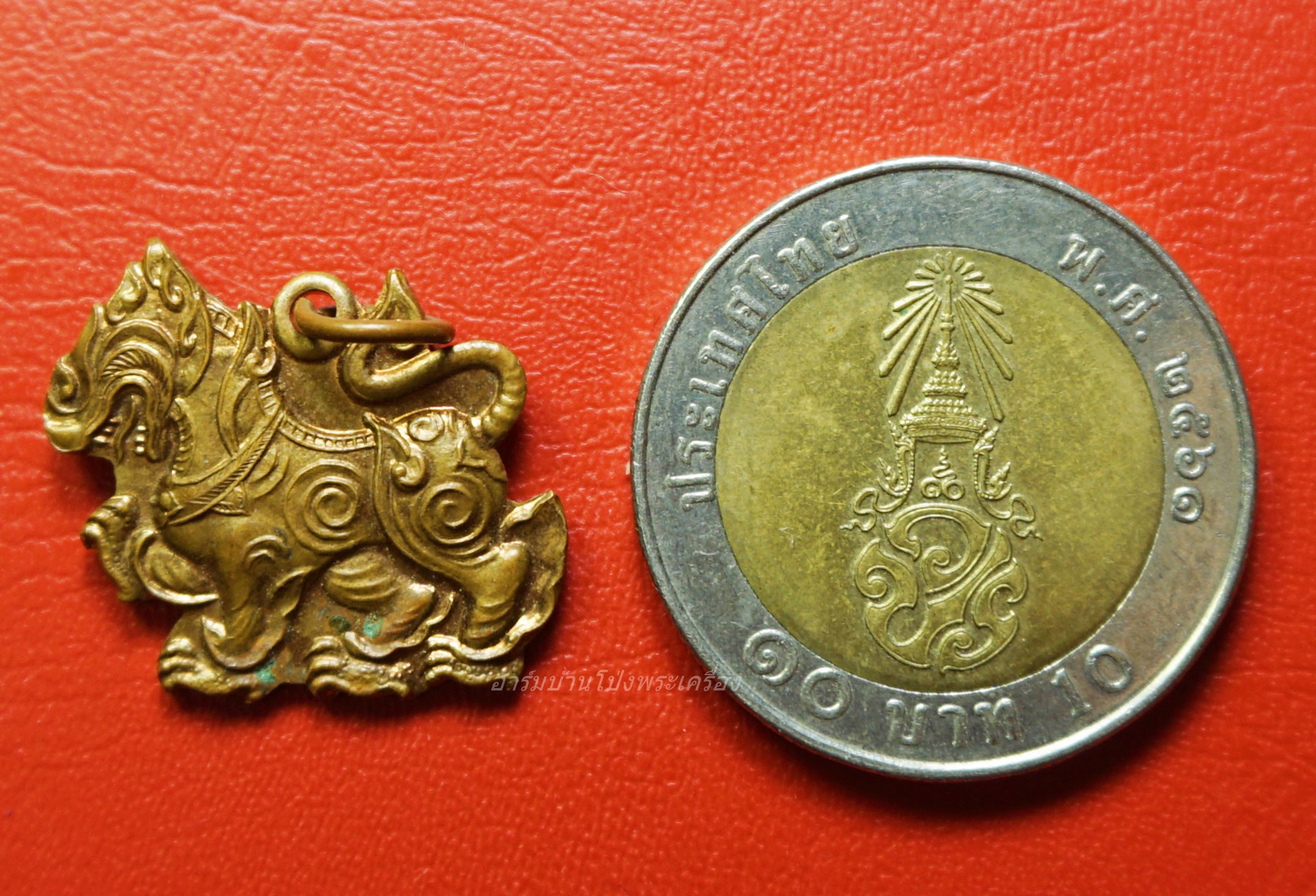 พระอธิการบัว วัดเขาแดน สิงห์ เนื้อทองแดง(องค์ที่1)