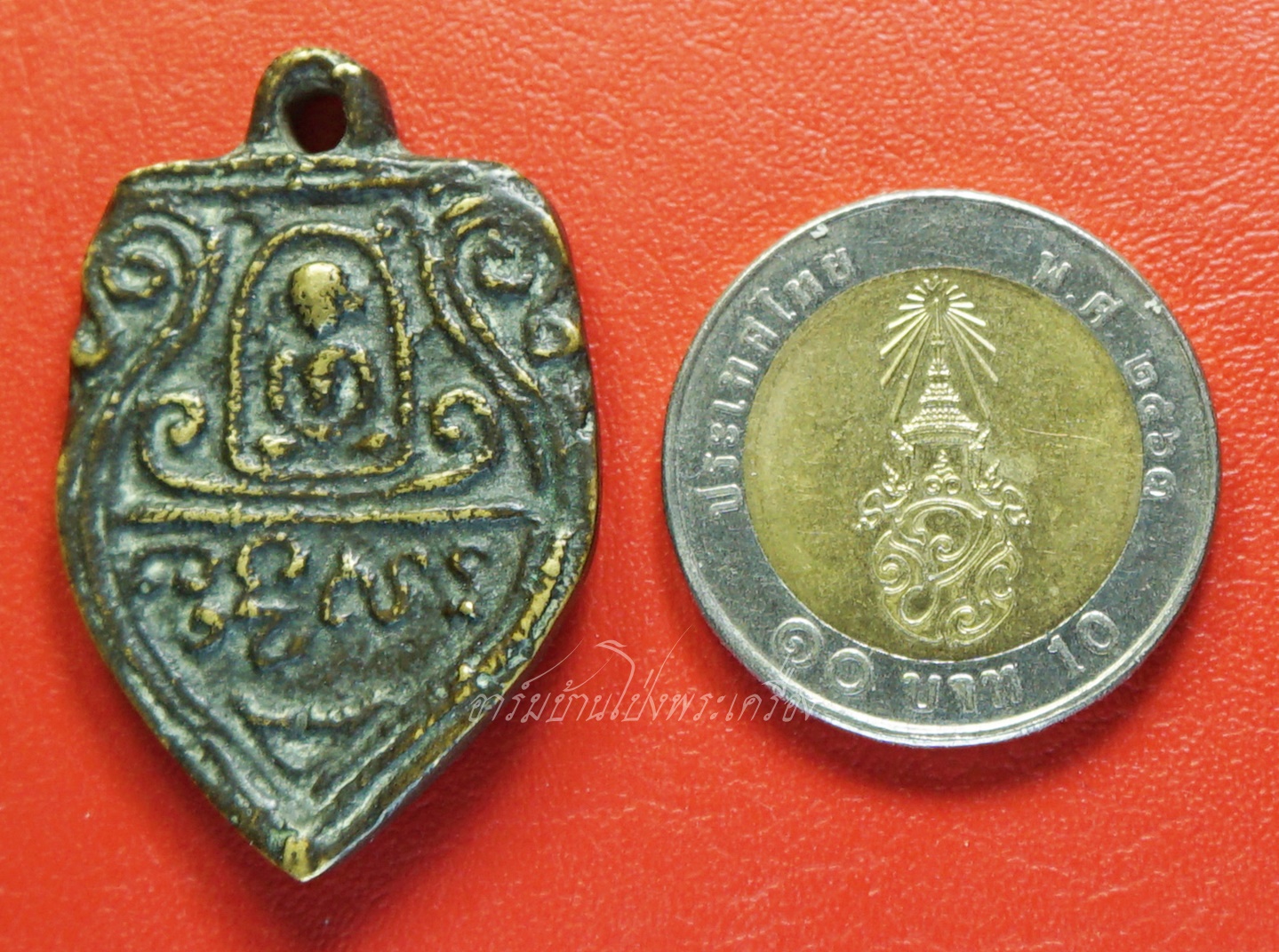 หลวงพ่อแบ๋ม วัดรางวาลย์ เหรียญหล่อ ปี๒๕๑๒ เนื้อทองเหลืองรมดำ(องค์ที่1)