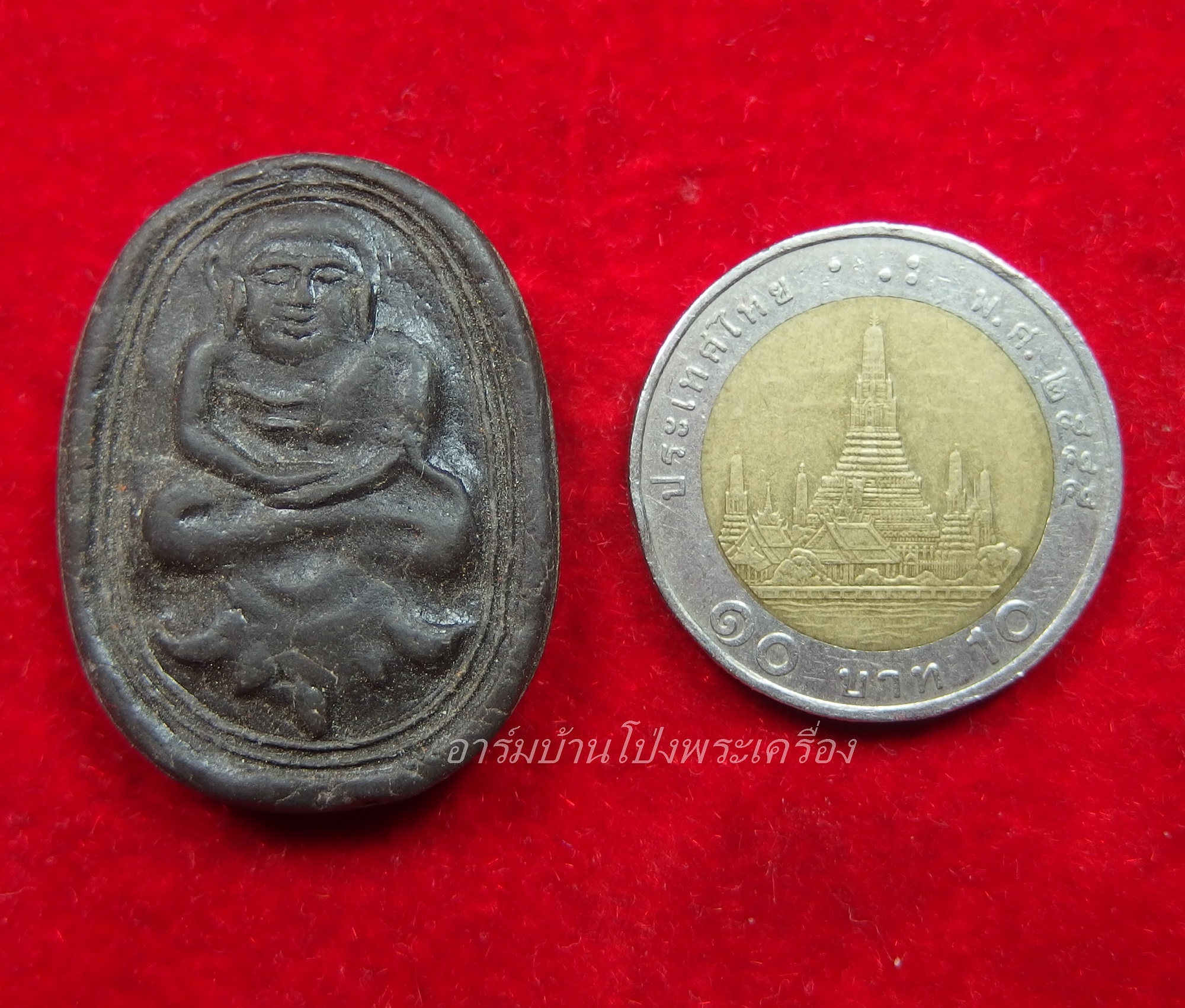 พระสังฆจาย วัดทุ่งผักกูด เนื้อผงสีดำ(องค์ที่1)