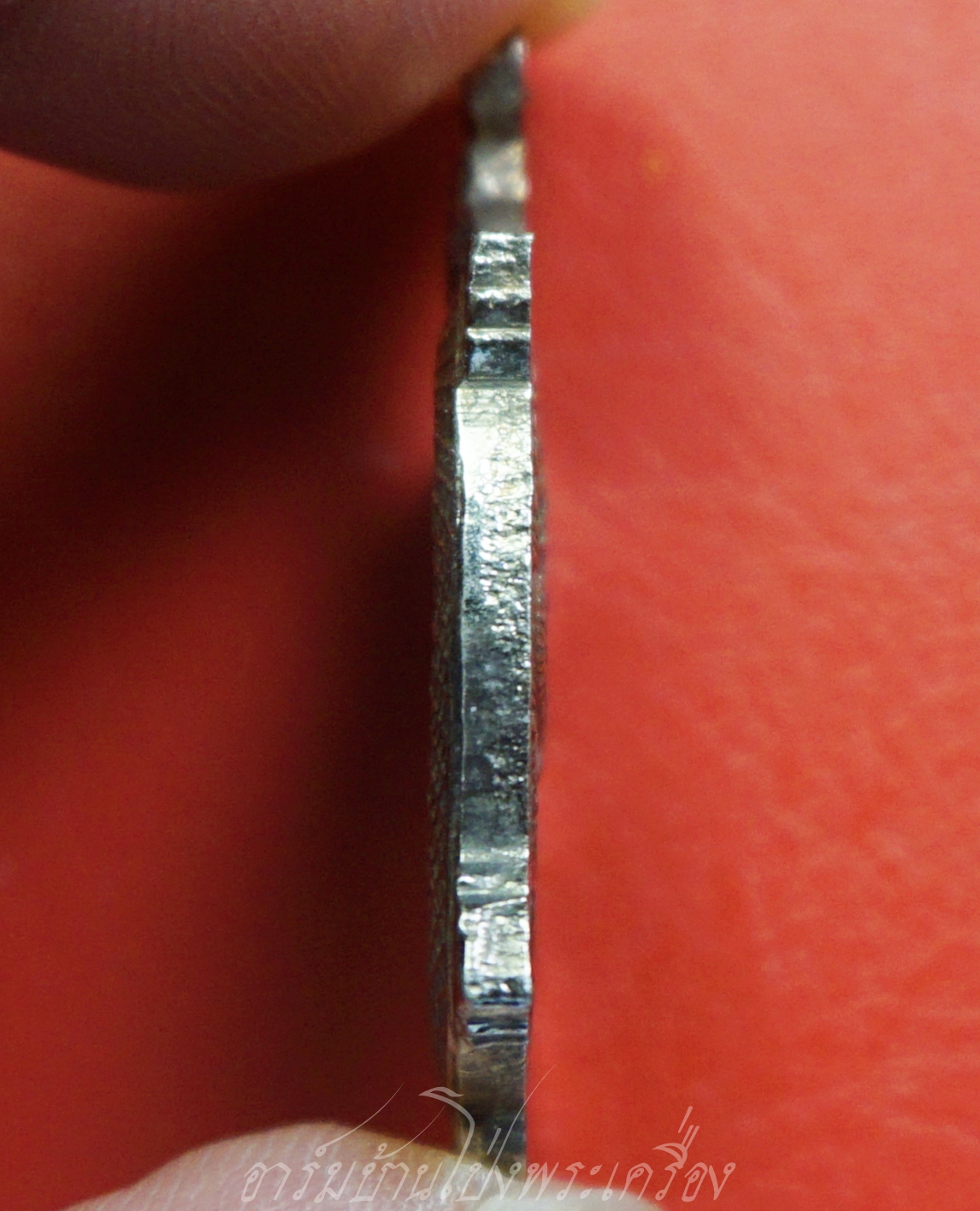 พระครูสันทัศน์กาญจนาภรณ์ วัดใหม่รางวาลย์กาญจนนิมิต เหรียญเต่าหลังยันต์พญานาค เนื้อกะไหล่เงิน(องค์ที่1)