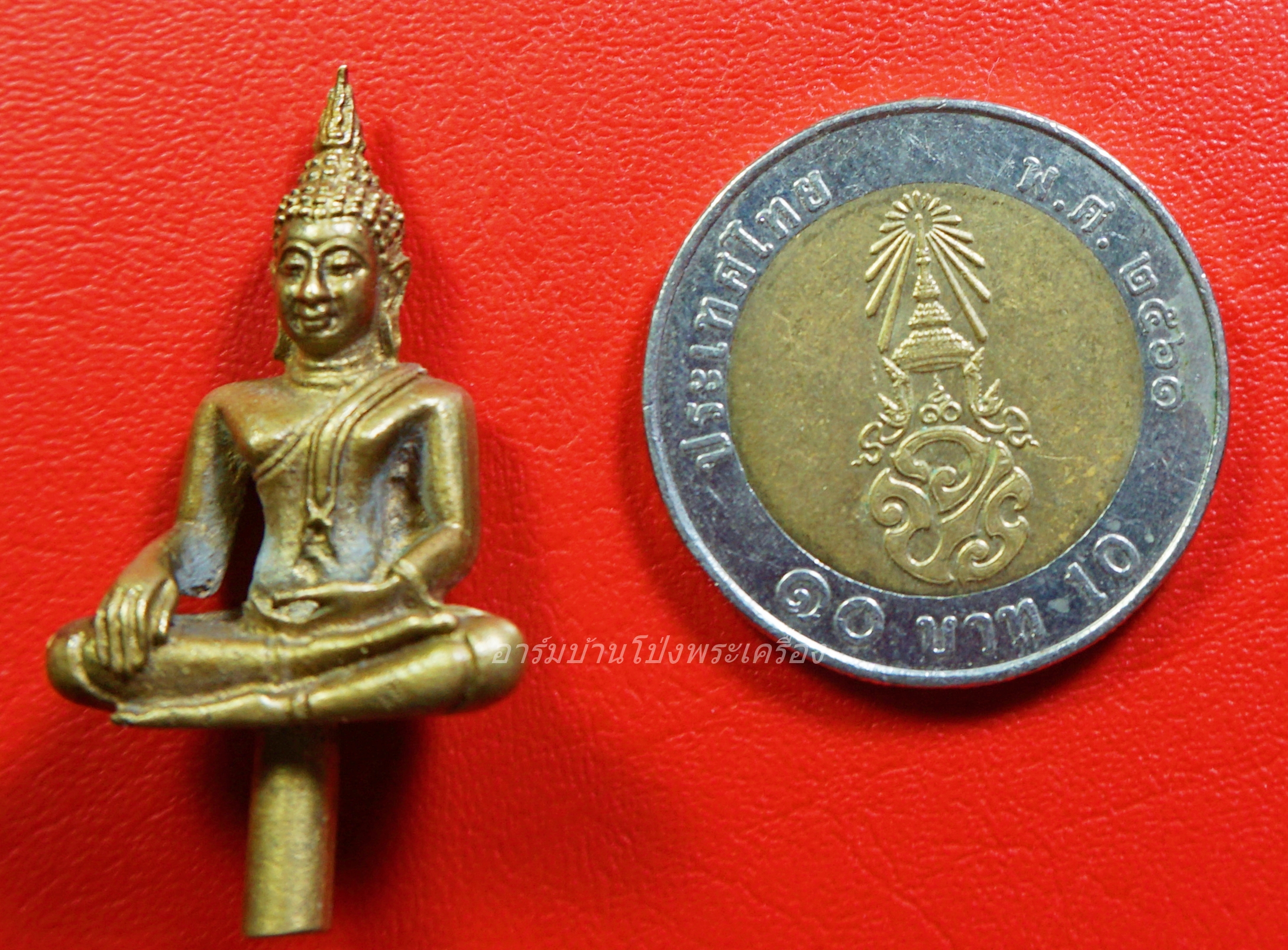 หลวงพ่อคูณ ปริสุทโธ วัดบ้านไร่ นครราชสีมา ยอดธง รุ่น๘๐ปี เนื้อทองฝาบาตร(องค์ที่1)