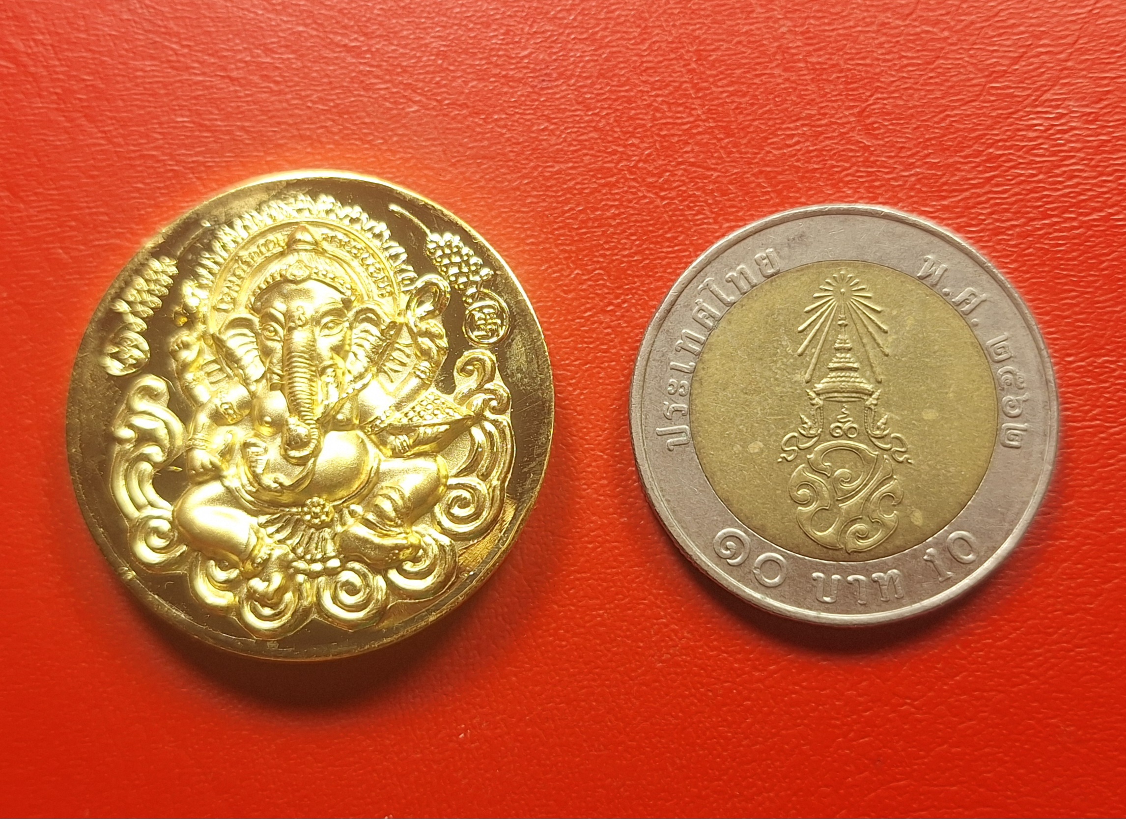 พระพิฆเนศหลังพ่อแก่ฤาษี วัดบางกุ้ง จ.สุพรรณบุรี รุ่นสมปรารถนา ปี๒๕๕๐ เนื้อกะไหล่ทอง ยิงเลเซอร์โค๊ตและหมายเลข(องค์ที่1)