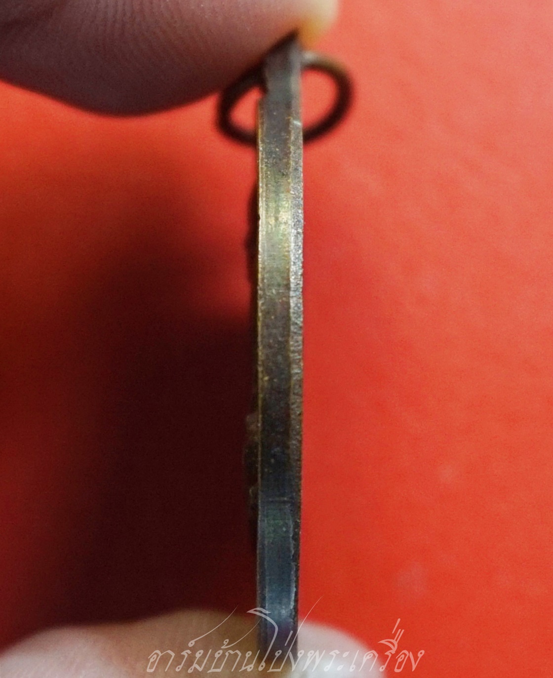 เหรียญหลวงพ่ออี๋ ที่หน่วยสงครามพิเศษทางเรือ สร้างปี๒๕๔๓ พิธีพุทธาภิเษก ณ วัดสัตหีบ จ.ชลบุรี เนื้อทองรมดำ(องค์ที่1)