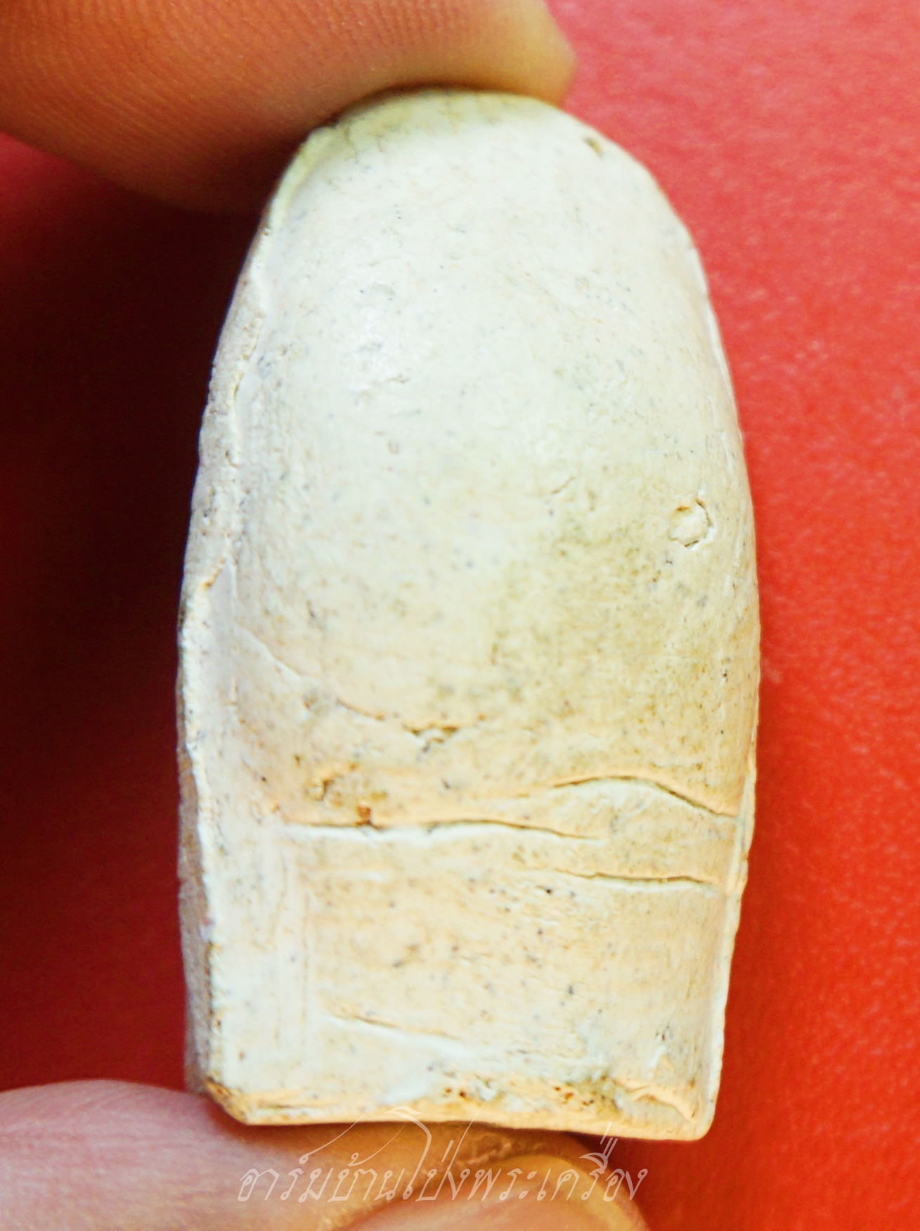 หลวงพ่อคูณ วัดบ้านไร่ นิ้วโป้งจำลอง ลงอักขระยันต์ ปี๒๕๓๖ เนื้อผง(องค์ที่9)