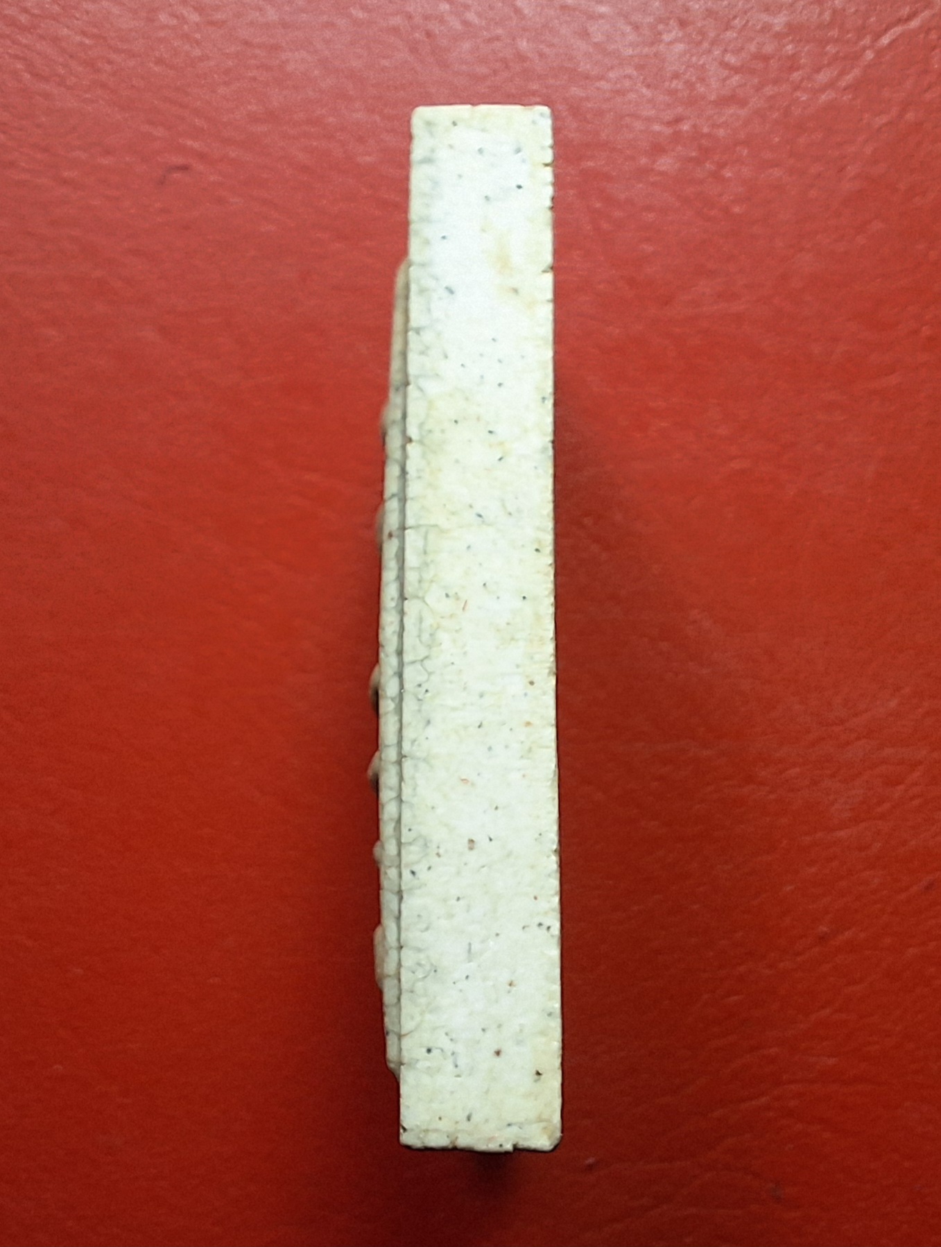 พระสมเด็จ วัดระฆังโฆษิตาราม รุ่นแตกลายงา ปี๒๕๕๒ ด้านหน้าปั๊มโค๊ตระฆัง ด้านหลังปั๊มตราวัด(องค์ที่1)