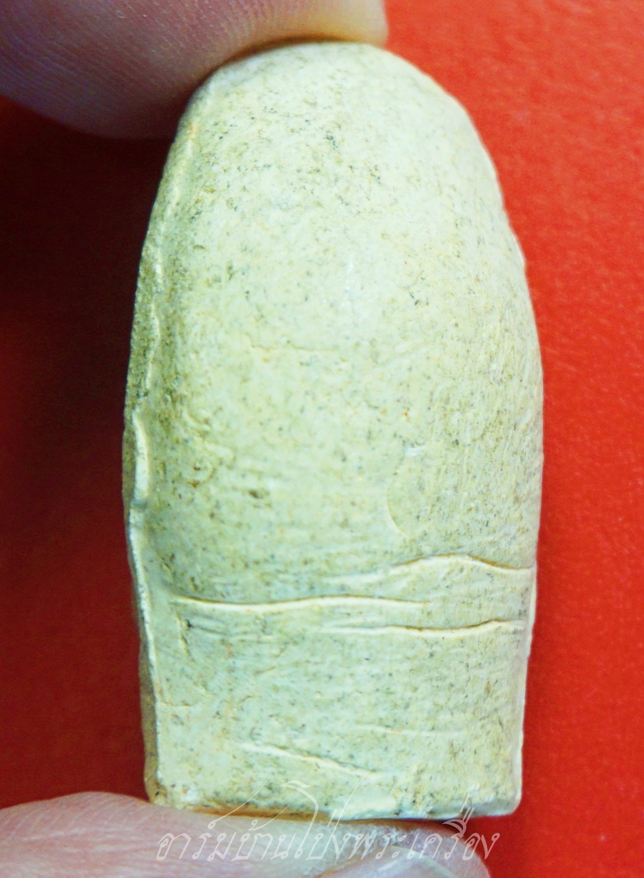 หลวงพ่อคูณ วัดบ้านไร่ นิ้วโป้งจำลอง ลงอักขระยันต์ ปี๒๕๓๖ เนื้อผง(องค์ที่7)