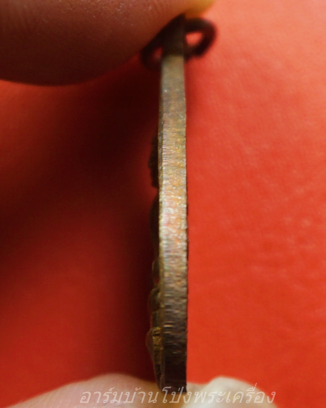 พระพุทธโพธิญาณ วัดเหนือบางแพ จ.ราชบุรี ปี๒๕๒๑ เหรียญรูปใบโพธิ์ เนื้อทองแดง เหรียญนี้มีเนื้อเกินใต้องค์พระ(องค์ที่1)