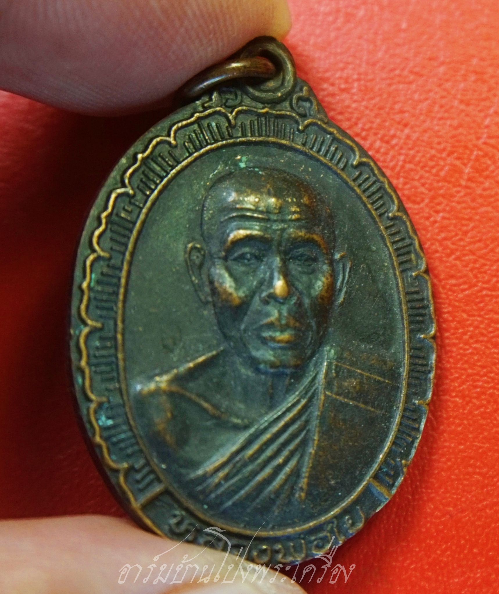 พระอาจารย์ใย วัดหนองอ้อตะวันออก รุ่นสร้างอุโบสถ ปี๒๕๓๘ เนื้อทองแดง(องค์ที่1)