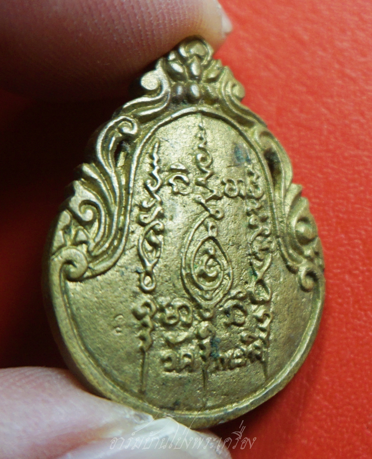 หลวงพ่อเขียน วัดกระทิง เหรียญหล่อ ทรงหยดน้ำ เนื้อทองเหลือง(องค์ที่1)