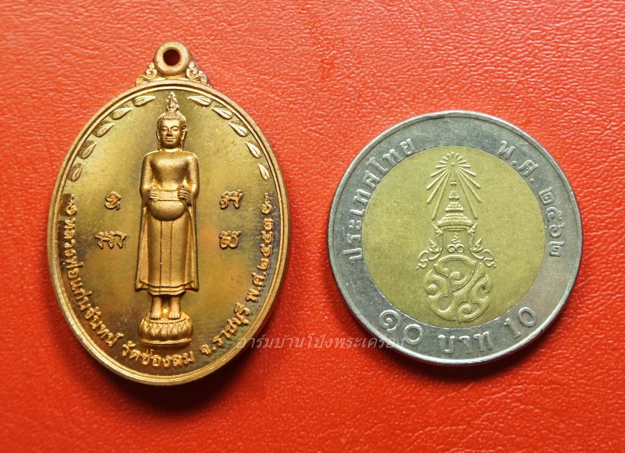 หลวงพ่อแก่นจันทน์ วัดช่องลม รุ่น ๑๐๐ ปี เสือป่ามหามงคล ปี ๒๕๕๓ เนื้อทองแดง พร้อมกล่อง(องค์ที่1)