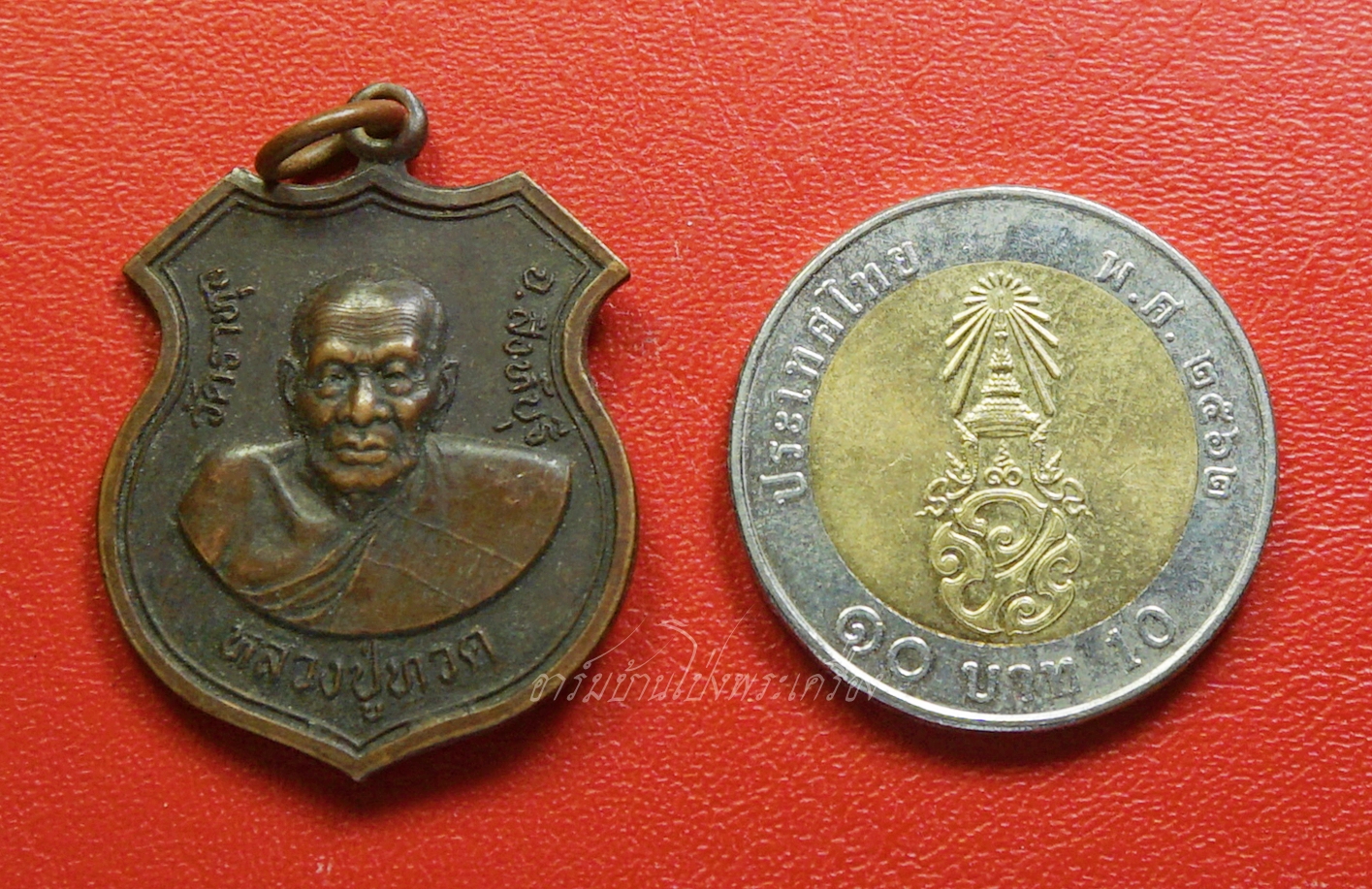 หลวงปู่ทวด หลังสมเด็จโต วัดราหุล จ.สิงห์บุรี ด้านหลังตอกโค๊ต เนื้อทองแดง(องค์ที่1)