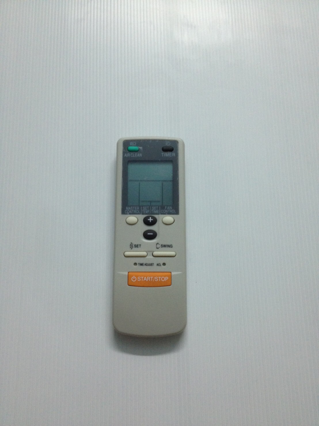 รีโมทแอร์ ฟูจิซึ Fujitsu ปุ่มส้ม