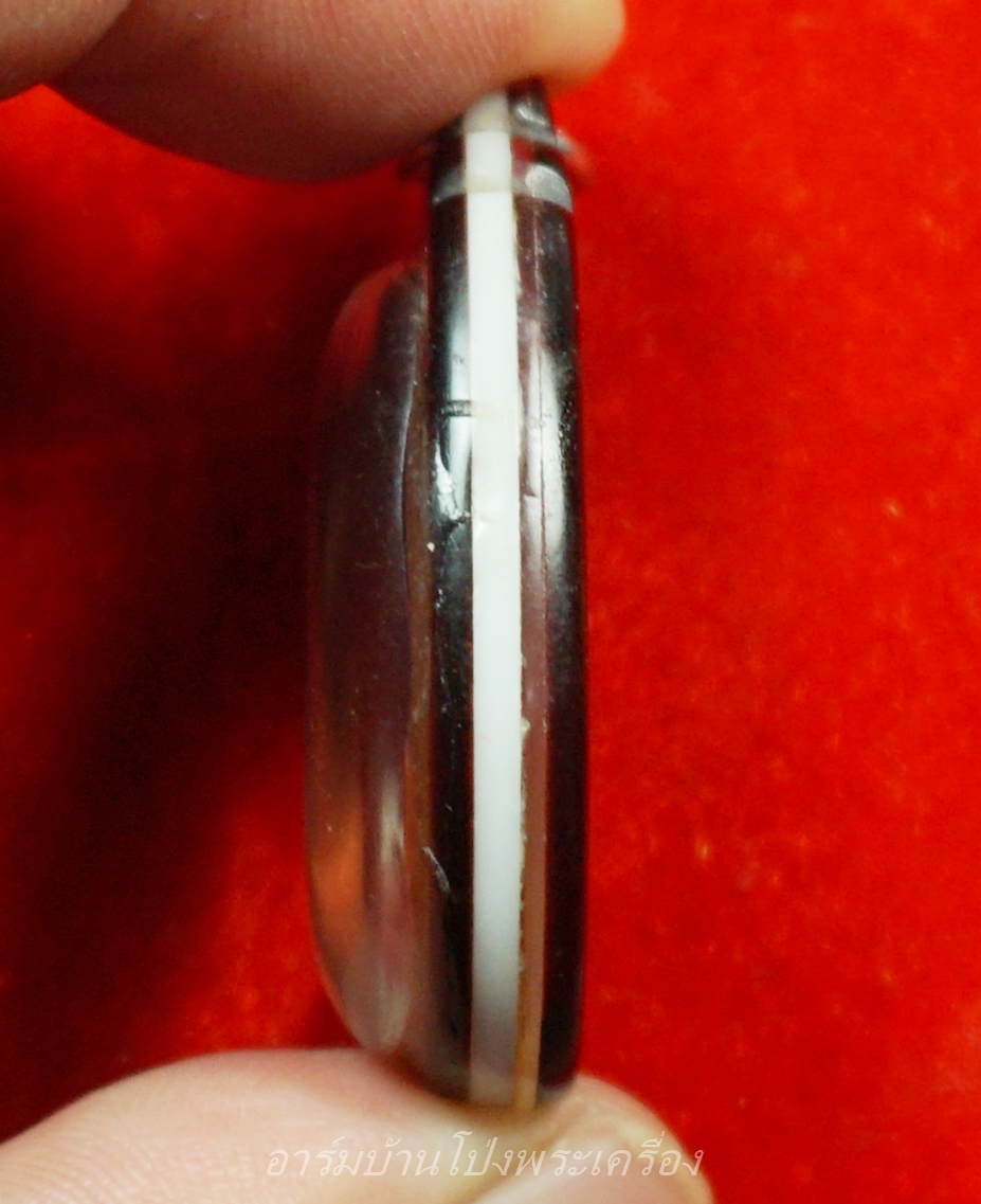 หลวงพ่อโต๊ะ วัดทำนบ รุ่นแรก ปี๒๕๑๓ เนื้อกะไหล่เงิน(องค์ที่3)