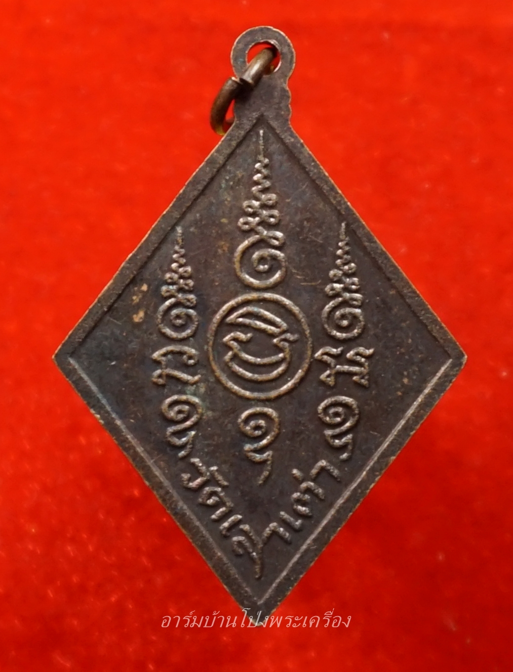 พระอธิการแกะ วัดเลาเต่า เนื้อทองแดง(องค์ที่1)