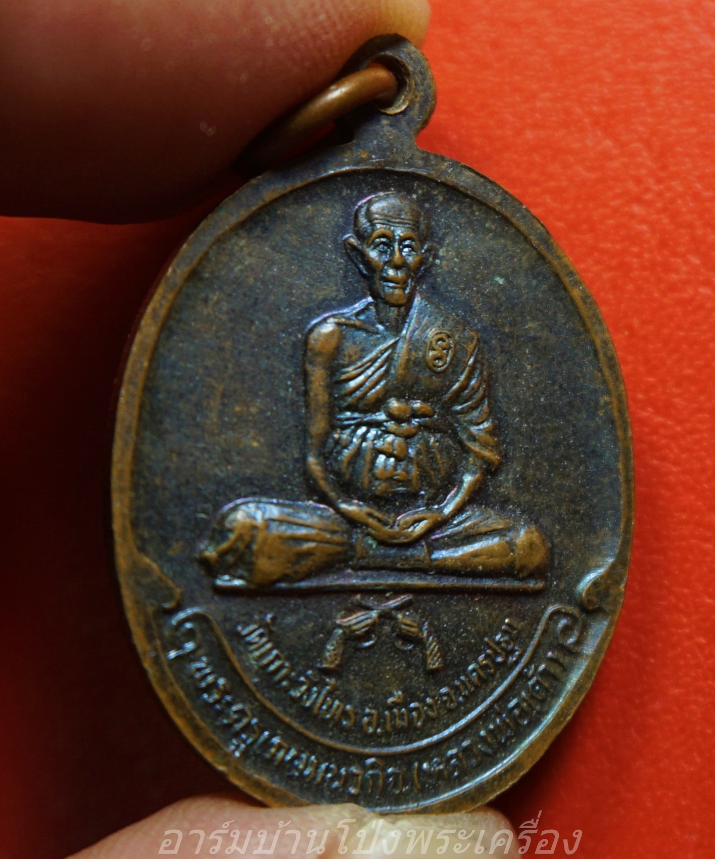 หลวงพ่อแดง หลัง หลวงพ่อเต้า วัดเกาะวังไทร จ.นครปฐม พ.ศ.๒๕๓๕ รุ่นสร้างมณฑป เนื้อทองแดงรมดำ(องค์ที่1)