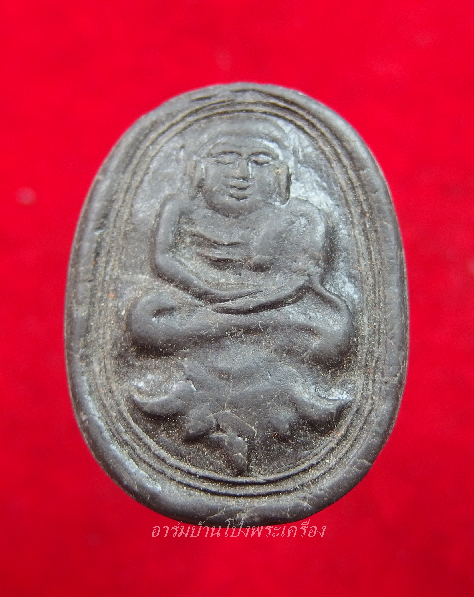 พระสังฆจาย วัดทุ่งผักกูด เนื้อผงสีดำ(องค์ที่1)