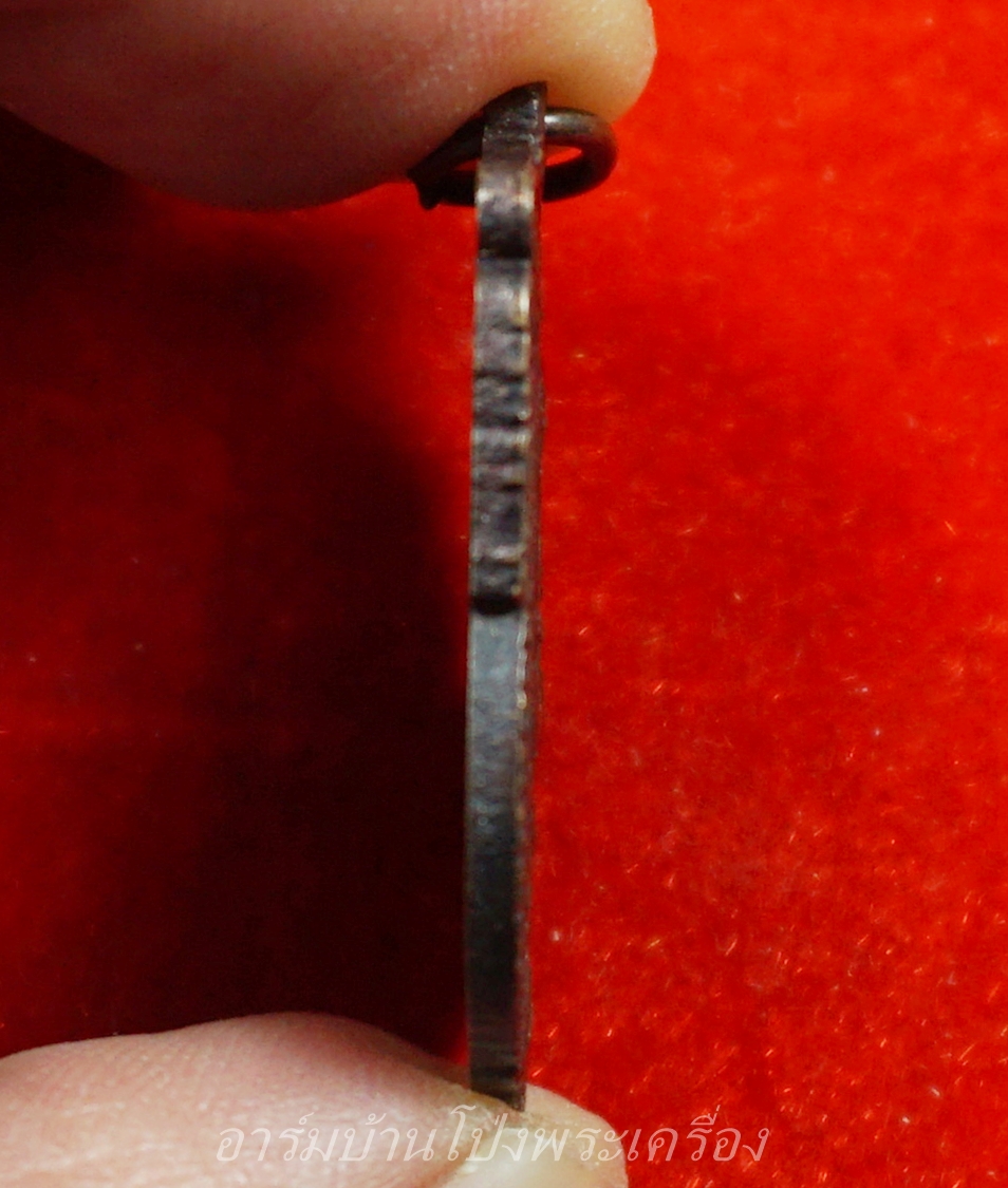 หลวงพ่อพุฒ วัดกลางบางพระ เหรียญนั่งปืน เนื้อทองแดง(องค์ที่1)