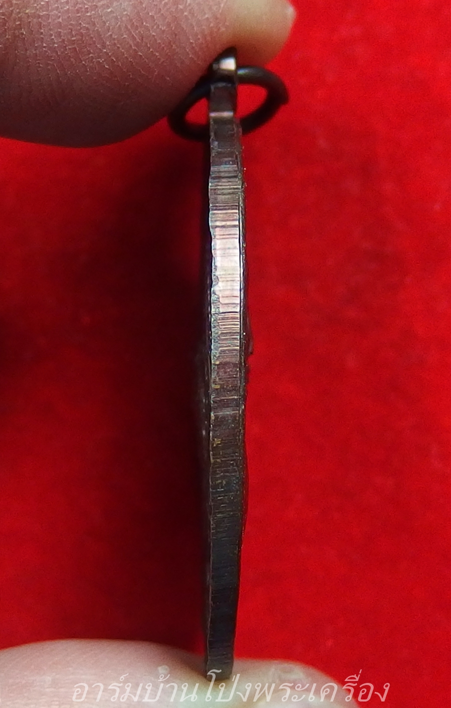 หลวงพ่อคิ้ม วัดหนองเสือ รุ่นแรก หลังสิงห์ เนื้อทองแดงรมดำ(องค์ที่2)