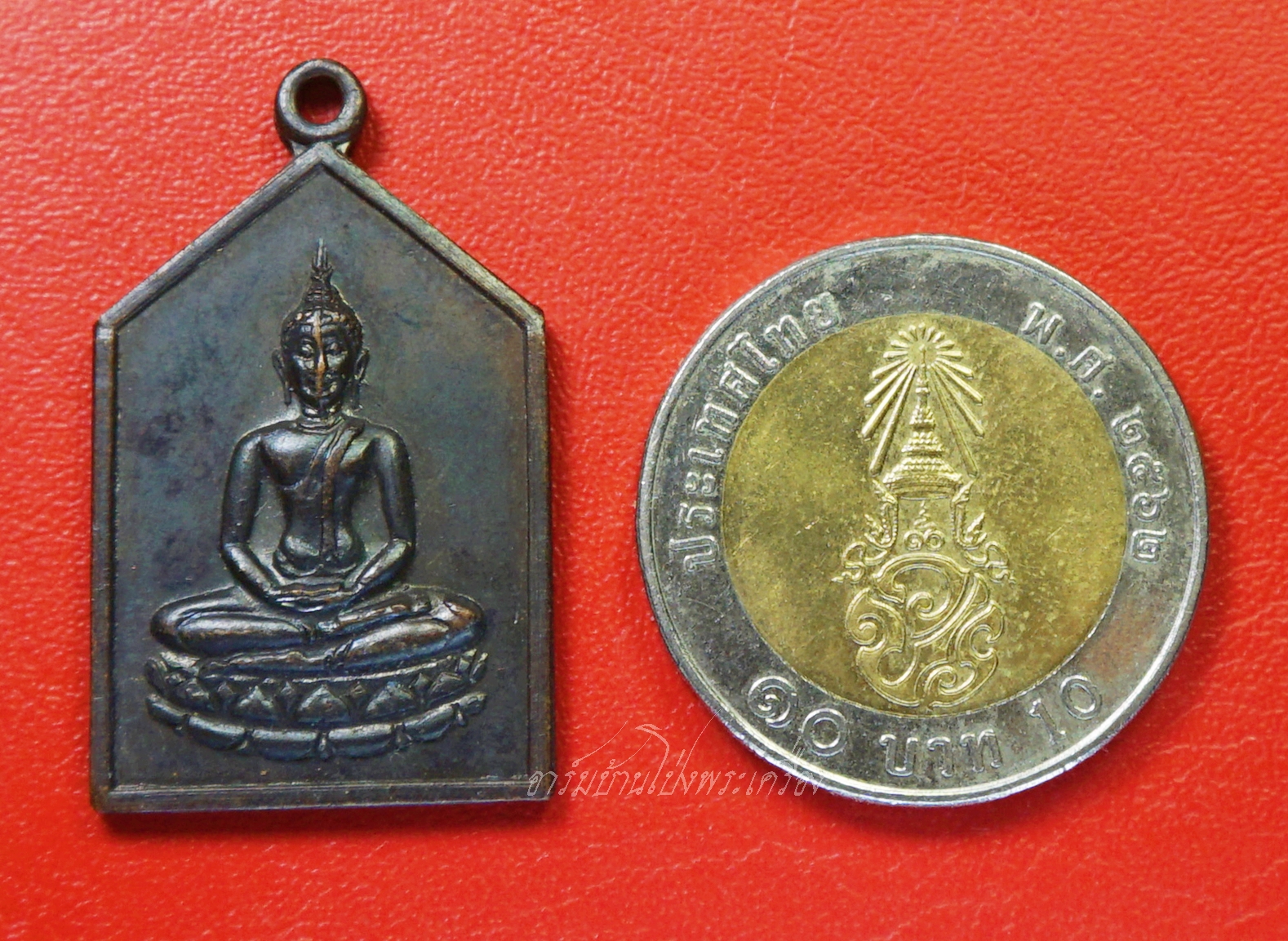 พระพุทธ วัดบ้านโป่ง หลังยันต์สามดวง เนื้อทองแดงรมดำ(องค์ที่1)