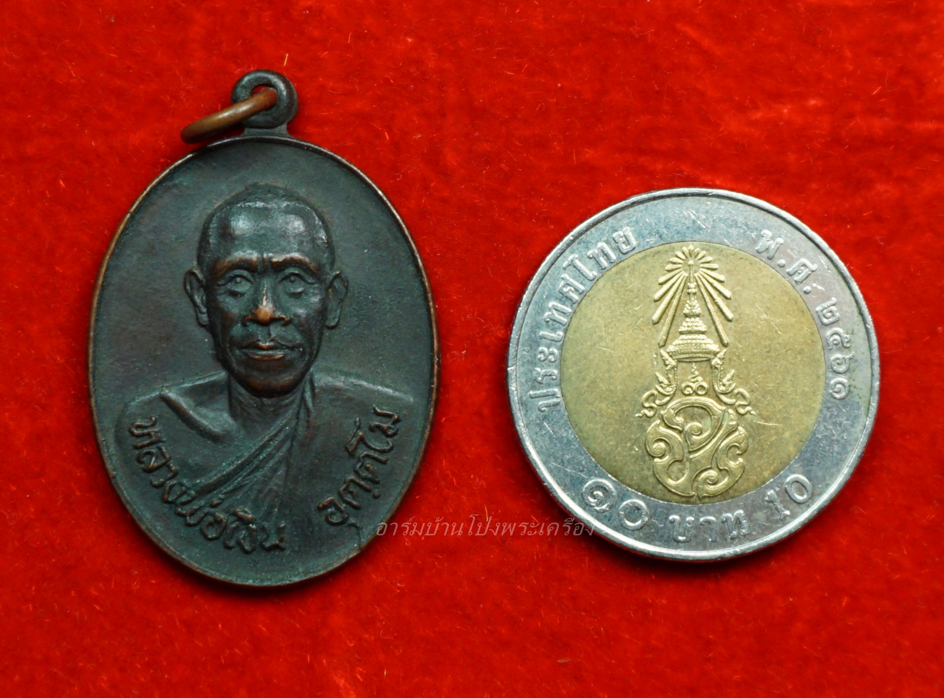 หลวงพ่อเงิน วัดจันทาราม หลังหนุมานสี่กร ที่ระลึกในงานผูกพัทธสีมา เนื้อทองแดงรมดำ(องค์ที่1)