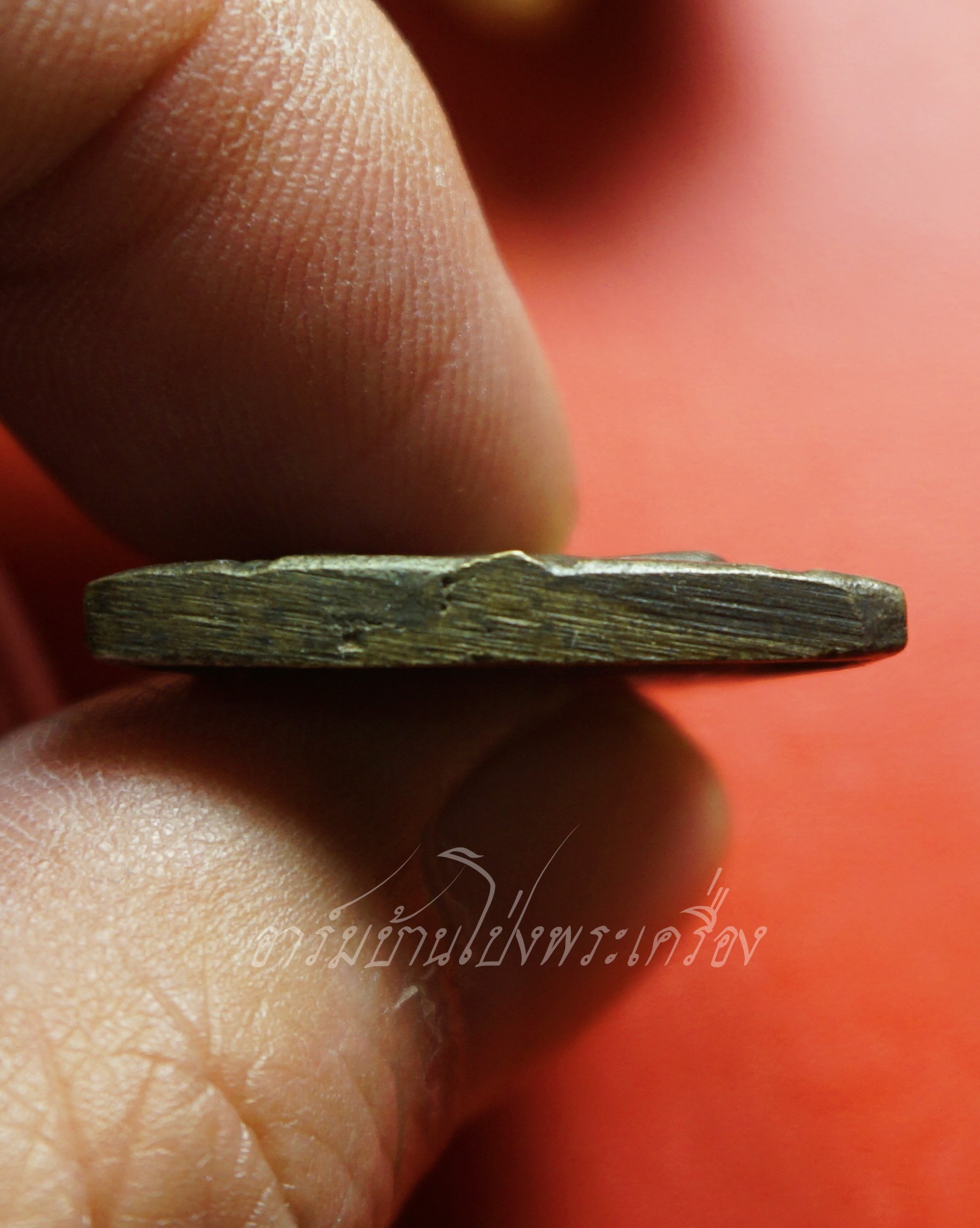 หลวงพ่ออุทัย วัดเกาะตาพุด(ศรีมฤคทายวัน) รุ่นสี่ ปี๒๕๔๒ เหรียญหล่อ(องค์ที่1)