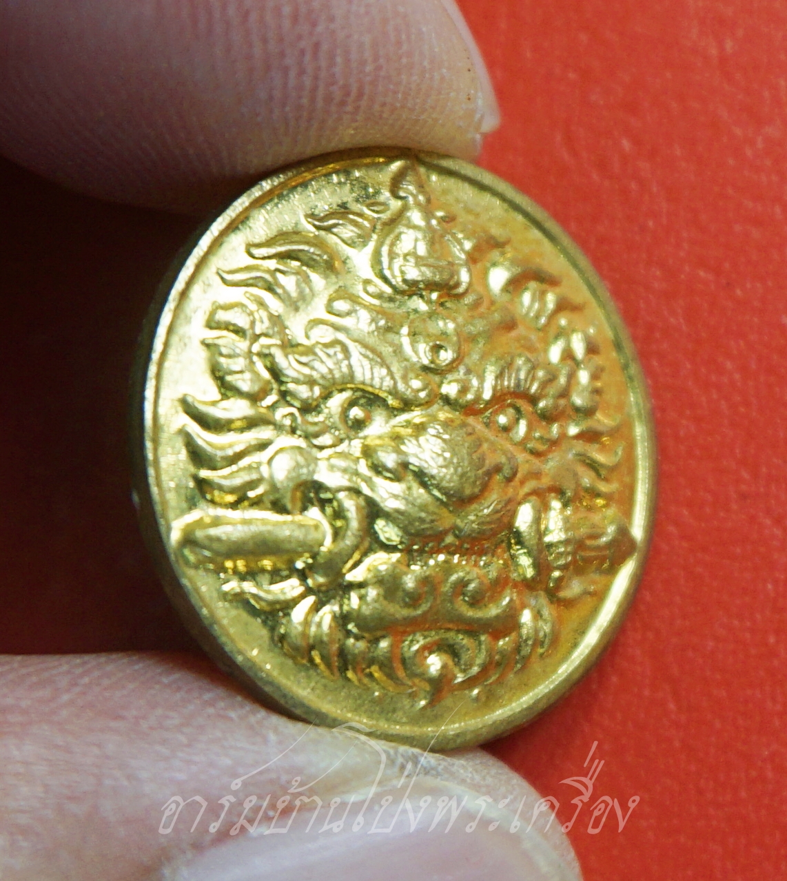 หลวงพ่อหวล วัดชาวเหนือ เสือคาบดาบ(กันชง) ปี๒๕๔๙ พิมพ์เล็ก กะไหล่ทอง(องค์ที่7)