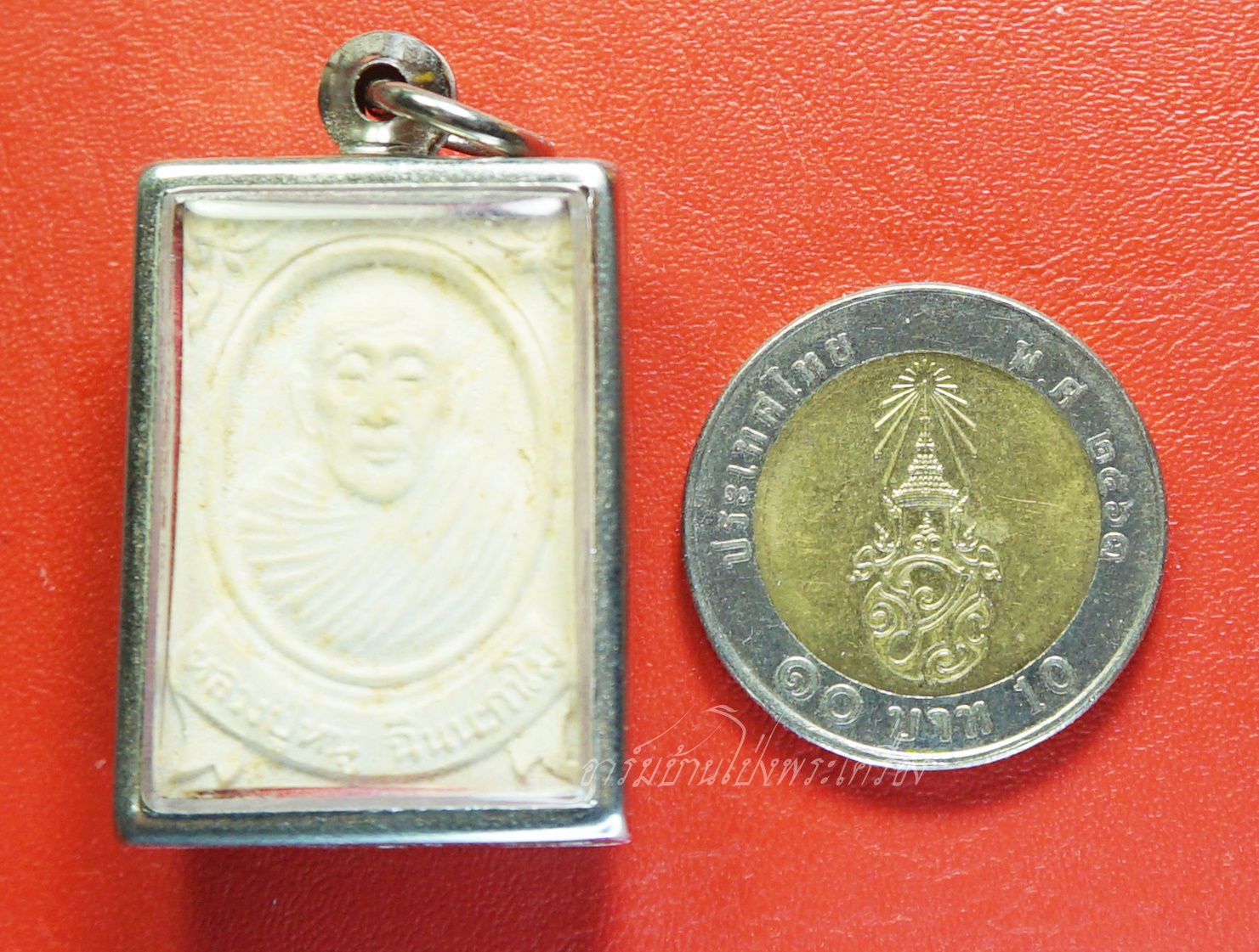 หลวงปู่หนู วัดทุ่งแหลม พระผงห่มคลุม หลังยันต์(องค์ที่6)