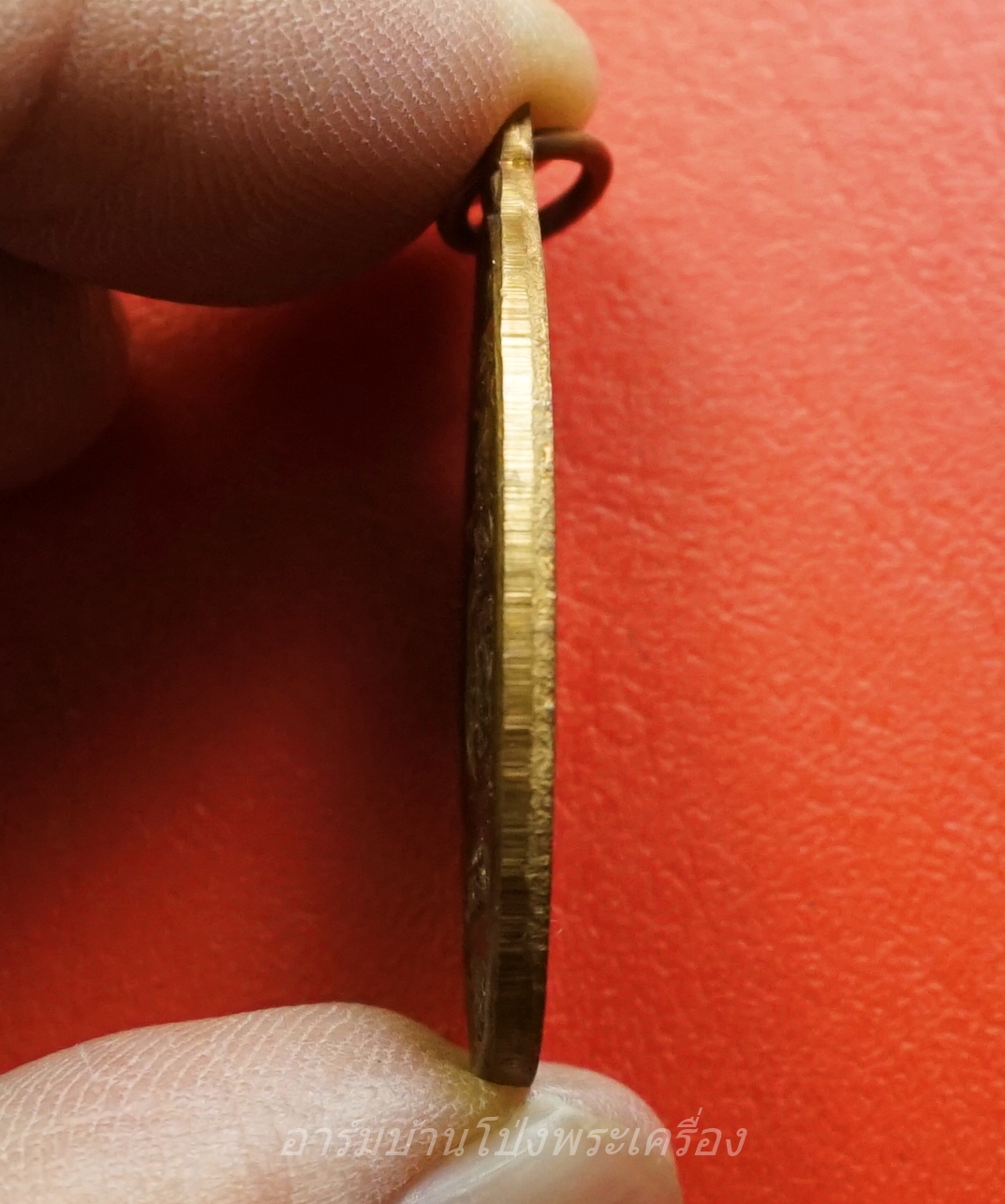 หลวงพ่อโก๊ะ วัดเก้าห้อง รุ่นปฏิสังขรโบสถ์ ปี๒๕๓๕ ขากลับ เนื้อทองแดง(องค์ที่2)