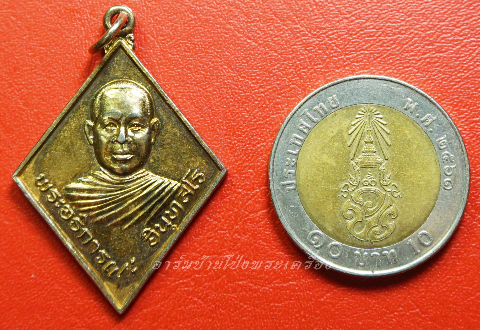 พระอธิการแกะ วัดเลาเต่า เนื้อกะไหล่ทอง(องค์ที่1)