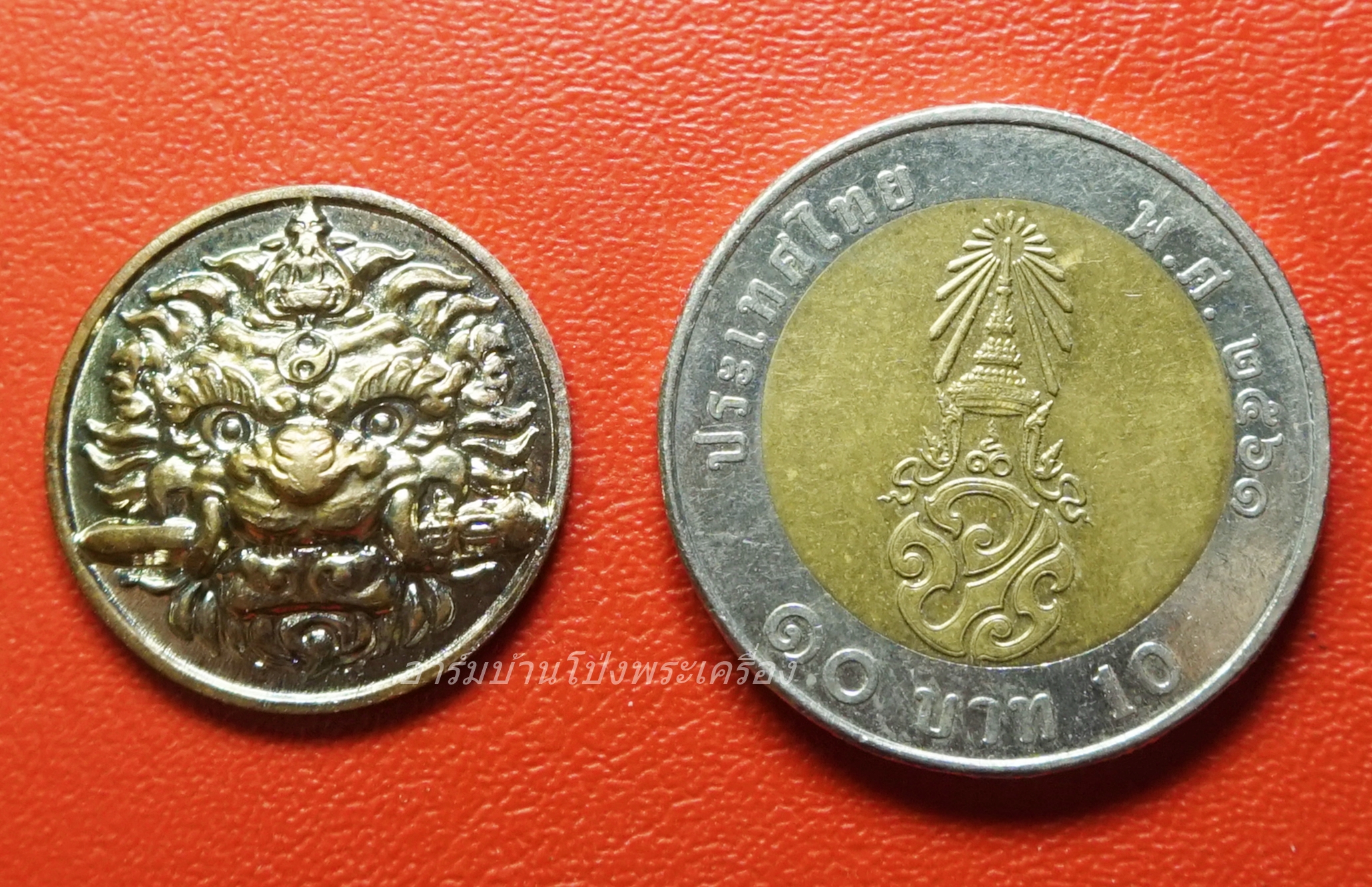 หลวงพ่อหวล วัดชาวเหนือ เสือคาบดาบ(กันชง) ปี๒๕๔๙ พิมพ์เล็ก กะไหล่นาค(องค์ที่2)