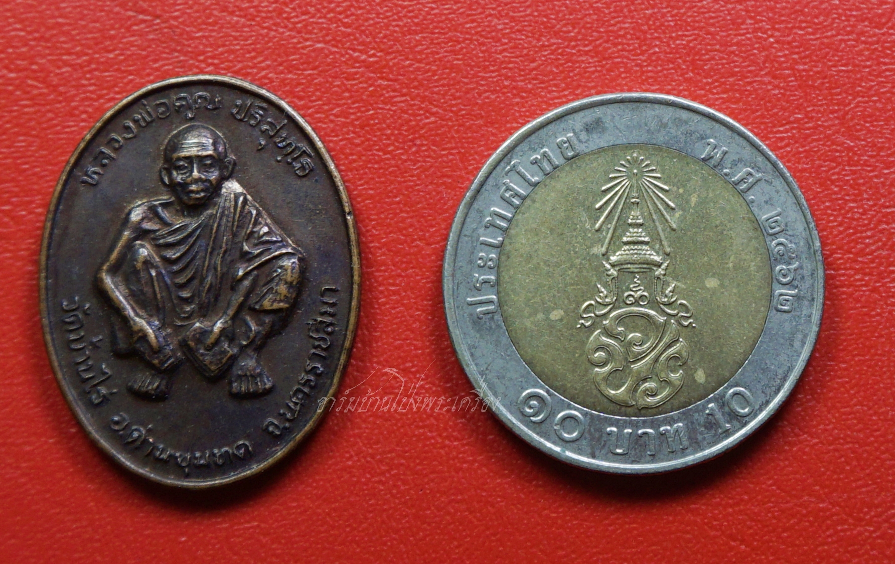 หลวงพ่อคูณ วัดบ้านไร่ หลังพระวิษณุกรรม รุ่นร่วมดีทวีคูณ ปลุกเสกเสาร์ห้า ปี๒๕๓๗ เนื้อทองแดงรมดำ(องค์ที่1)