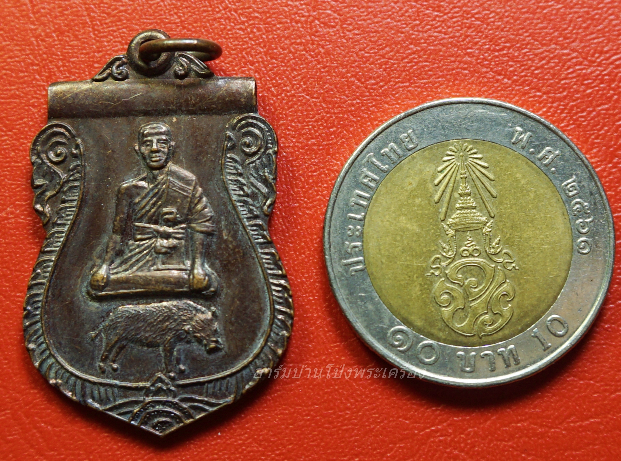 พระอธิการบัว วัดเขาแดน รุ่นเททองหล่อพระประธาน ปี๒๕๓๘ นั่งหมูป่า เนื้อทองแดงรมดำ(องค์ที่1)