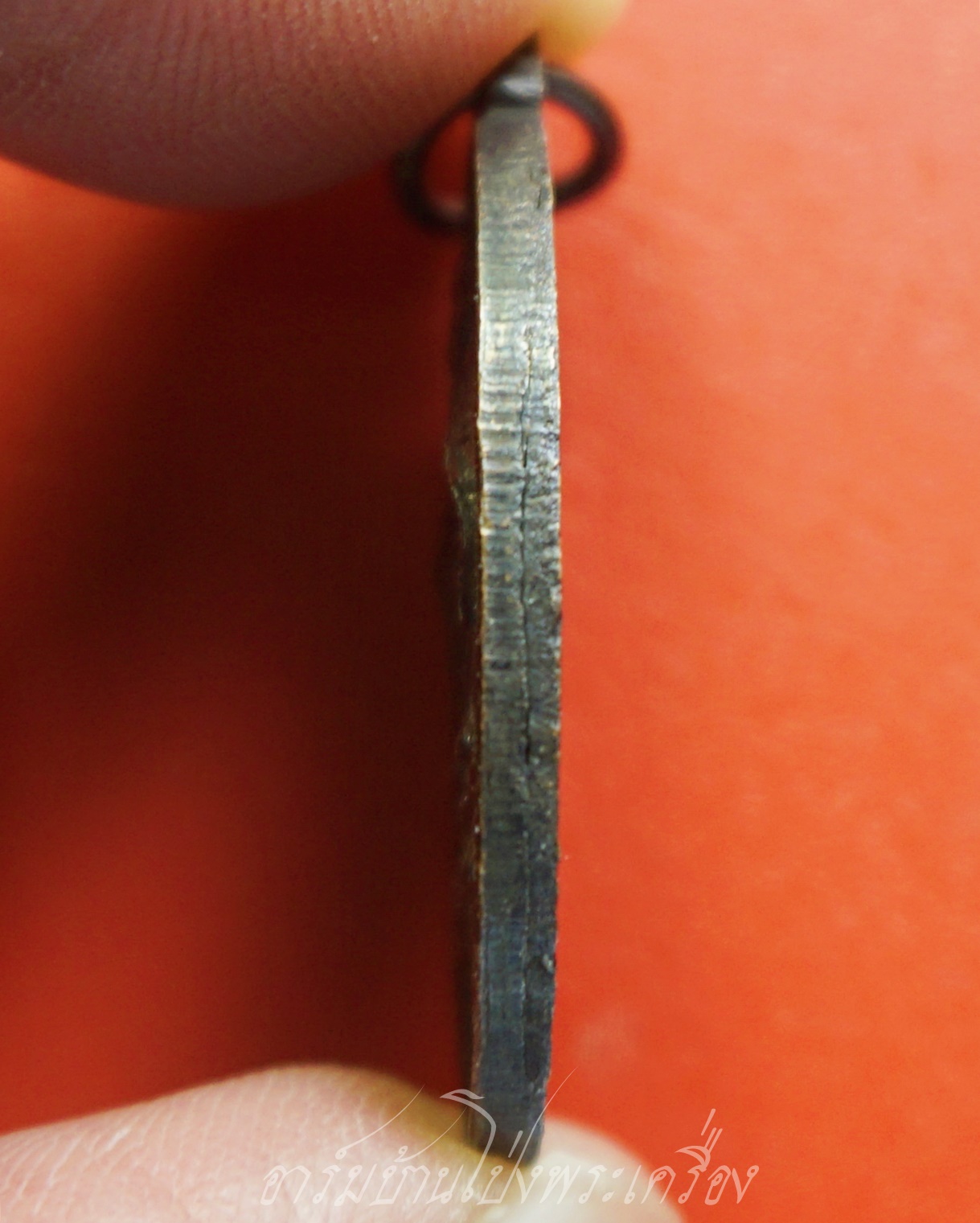 หลวงพ่อคูณ วัดบ้านไร่ รุ่นนั่งรถถัง ปี๒๕๓๘ เนื้อทองแดงรมดำ(องค์ที่1)