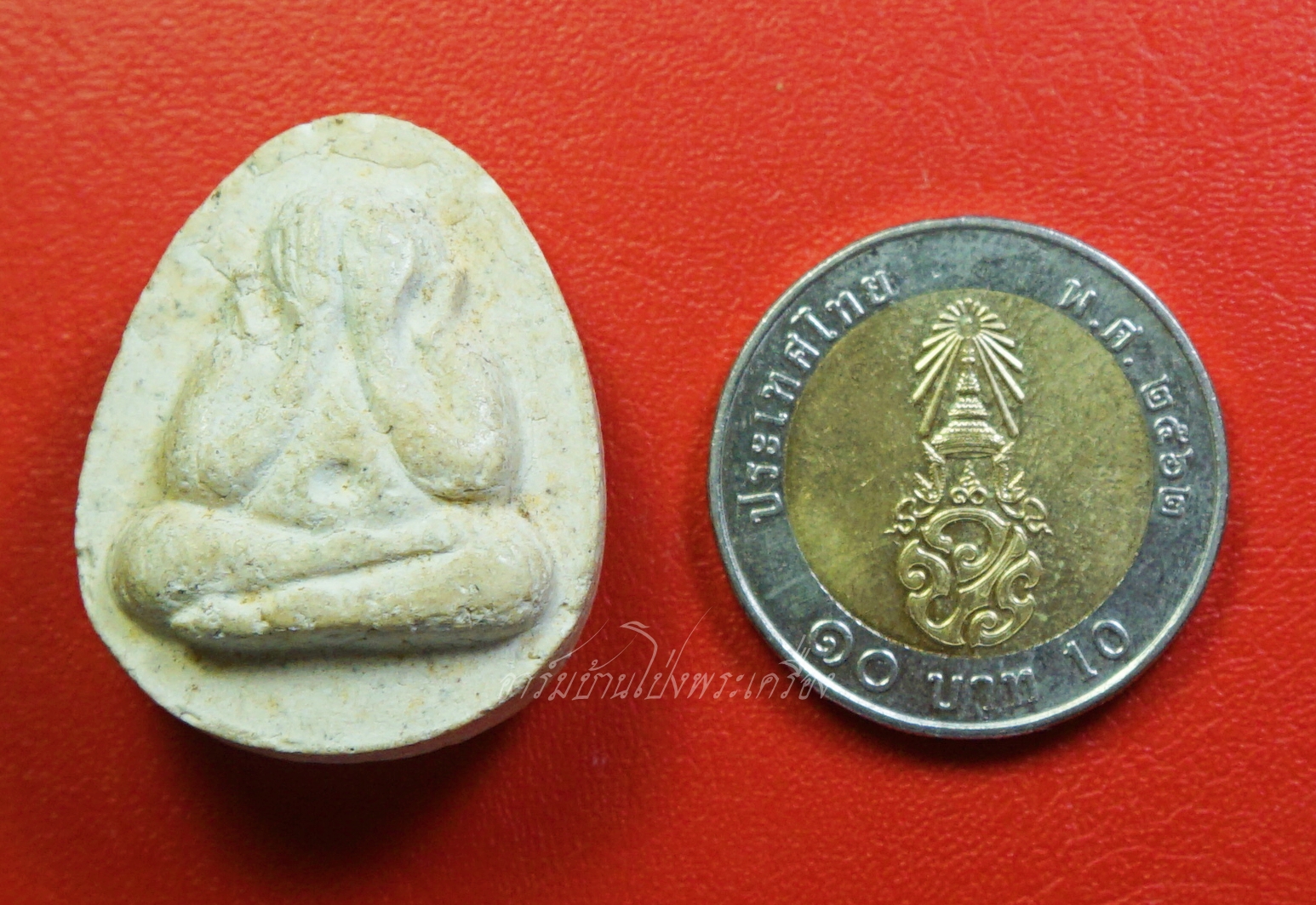 หลวงพ่อยิด วัดหนองจอก เนื้อผงสีขาว(องค์ที่1)