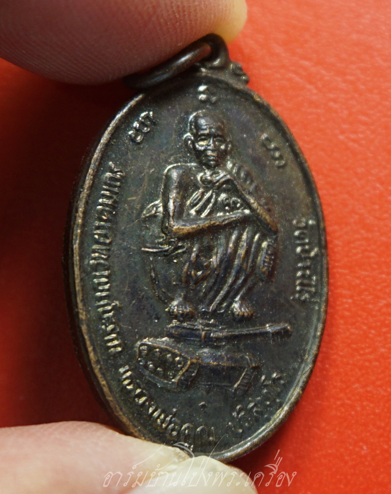 หลวงพ่อคูณ วัดบ้านไร่ รุ่นนั่งรถถัง ปี๒๕๓๘ เนื้อทองแดงรมดำ(องค์ที่1)