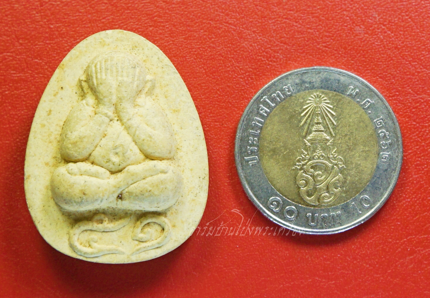 หลวงพ่ออุทัย วัดเกาะตาพุด ปี๒๕๕๑ ปิดตา รุ่นร่ำรวย มีกำไร(องค์ที่1)