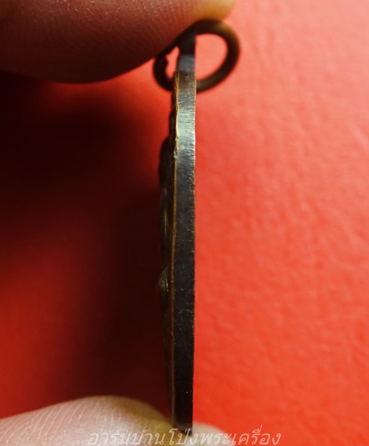 หลวงพ่อเงิน ขนฺติโก วัดถ้ำน้ำ เสาร์ห้า เนื้อทองแดงรมดำ เป็นเหรียญทรงตาลปัด(องค์ที่1)