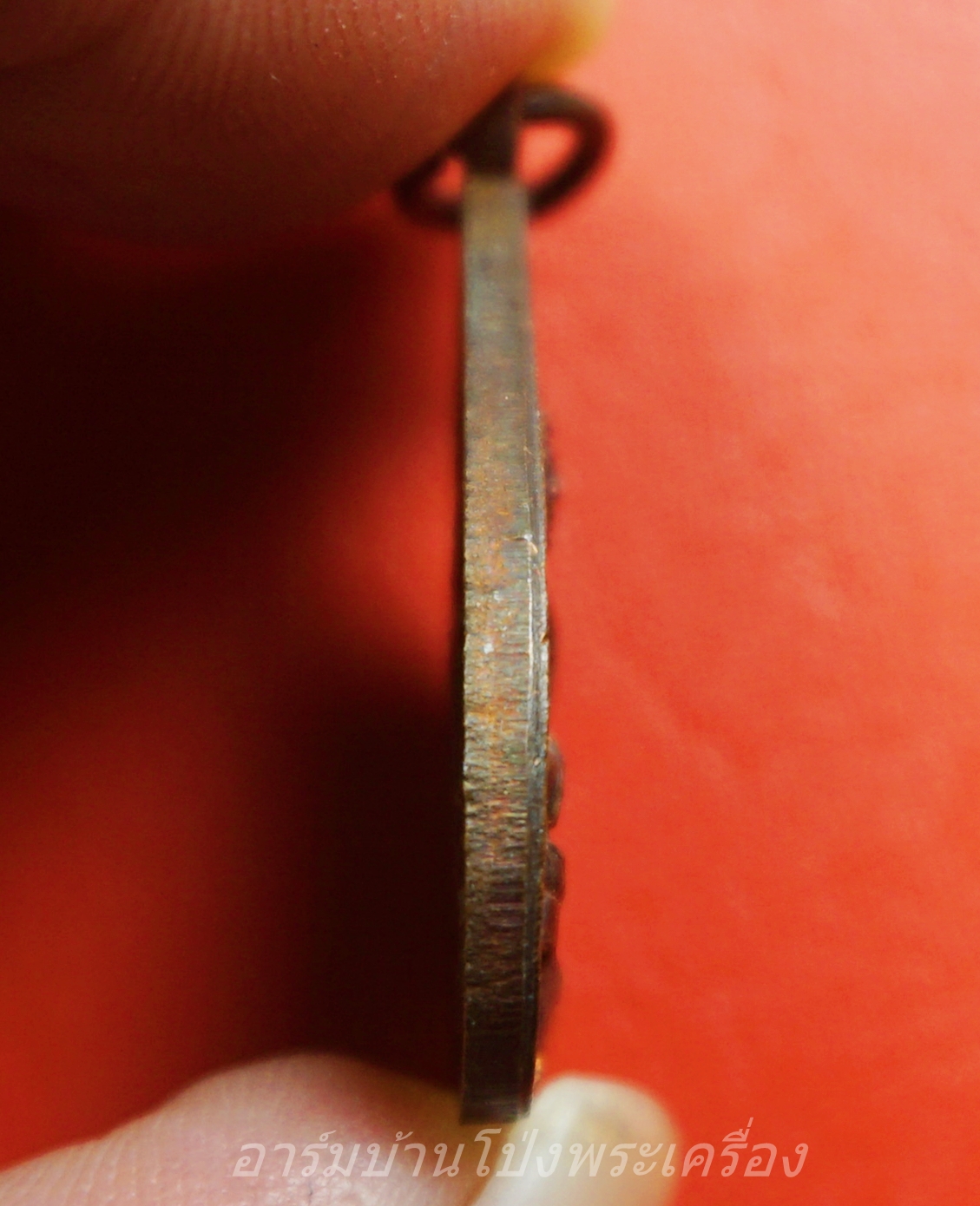 พระพุทธโพธิญาณ วัดเหนือบางแพ จ.ราชบุรี ปี๒๕๒๑ เหรียญรูปใบโพธิ์ เนื้อทองแดง เหรียญนี้มีเนื้อเกินใต้องค์พระ(องค์ที่1)