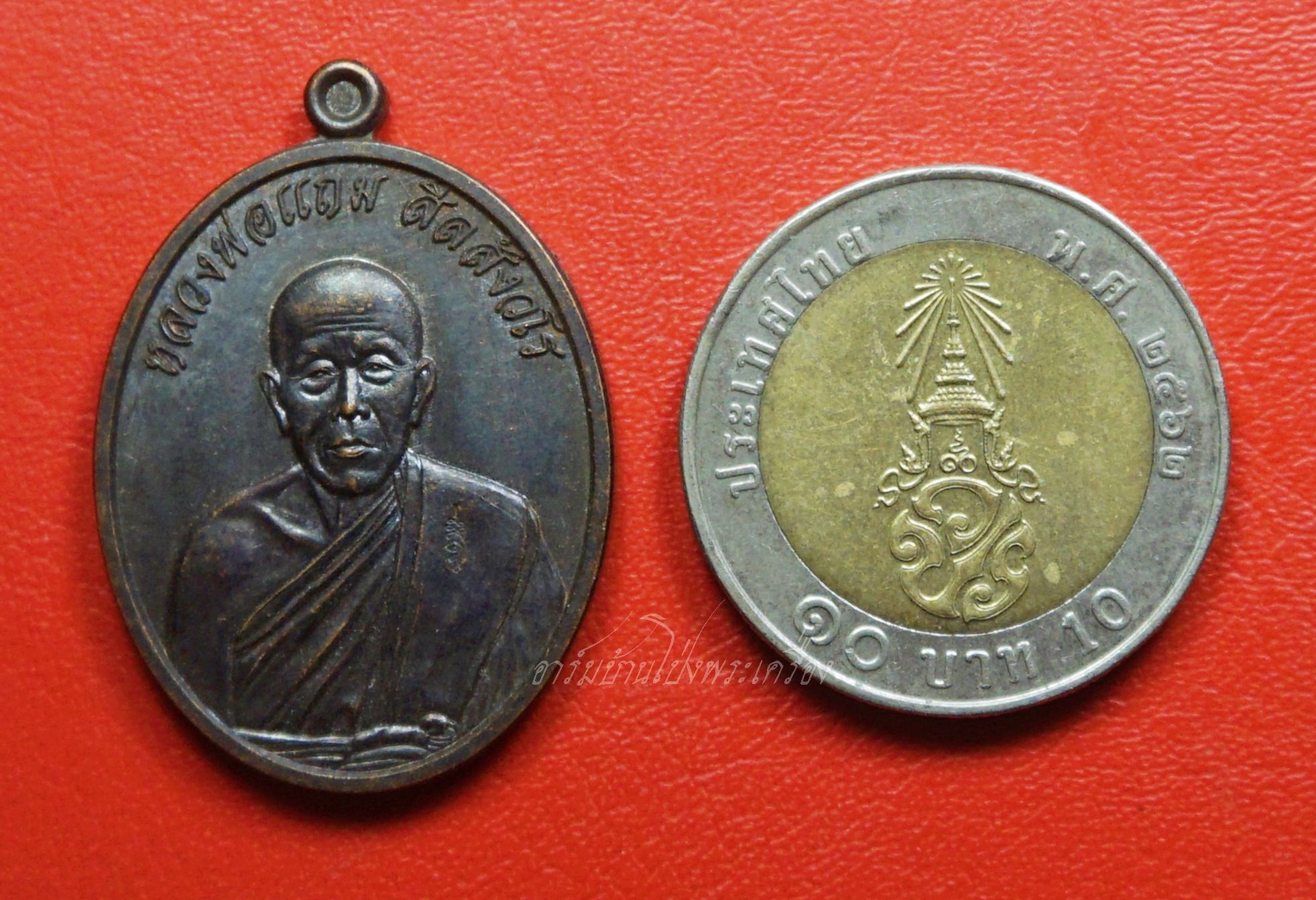 หลวงพ่อแถม วัดช้างแทงกระจาด จ.เพชรบุรี ที่ระลึกในงานทอดกฐิน ปี๒๕๕๖ เนื้อทองแดงรมดำ(องค์ที่1)