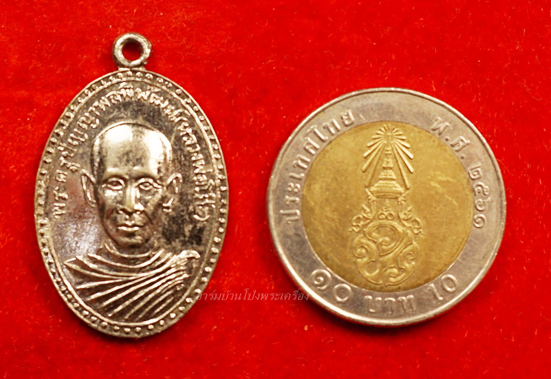 หลวงพ่อโต๊ะ วัดทำนบ รุ่นแรก ปี๒๕๑๓ เนื้อกะไหล่เงิน(องค์ที่5)