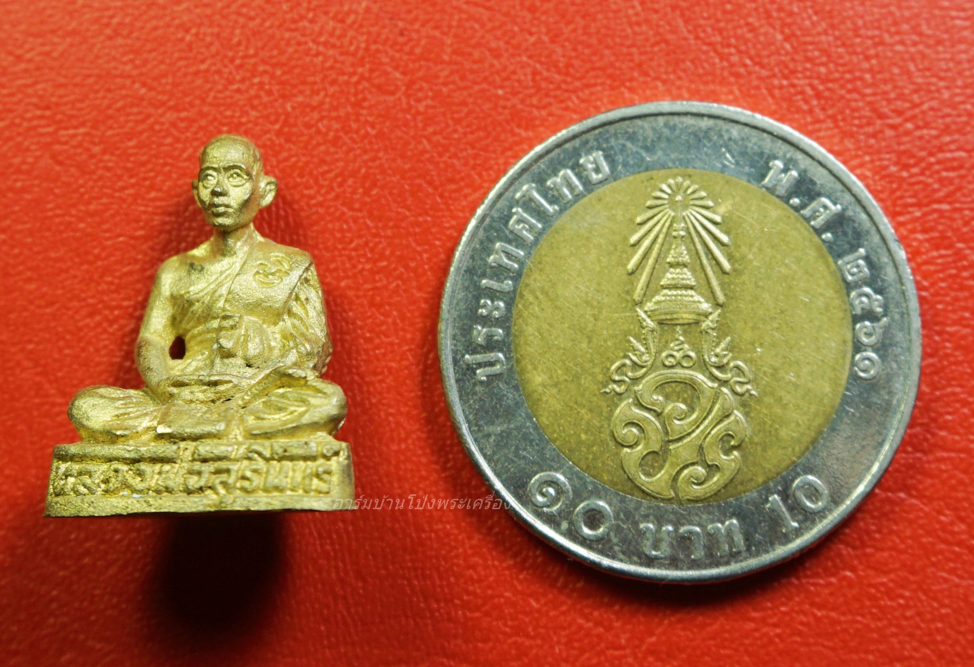 หลวงพ่อสุรินทร์ วัดลาดบัวขาว(หลวงพ่อสอนสร้าง) ปี๒๕๕๓ รูปหล่อ เนื้อฝาบาตร(องค์ที่4)