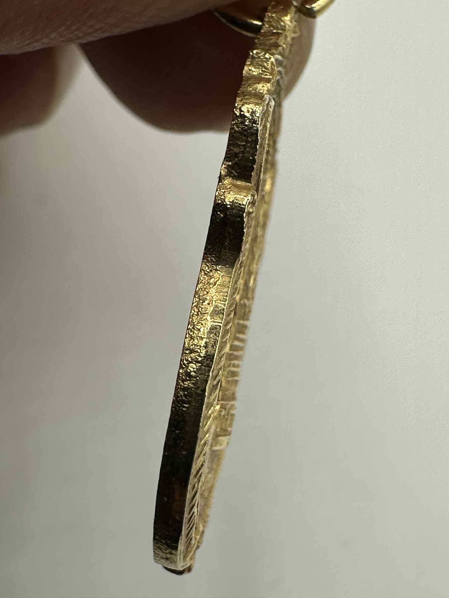 34. เหรียญเสมาฉลุ กะไหล่ทอง พระธาตุพนม วัดพระธาตุพนม จังหวัดนครพนม