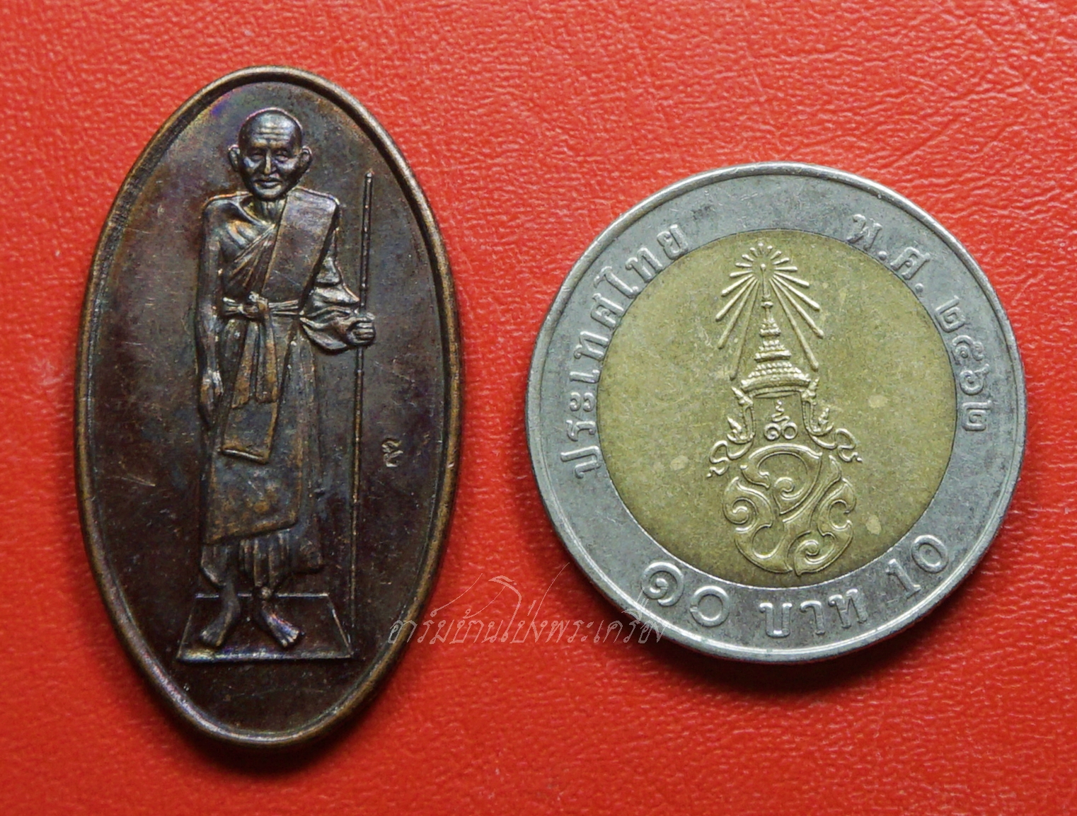 หลวงปู่ศุข วัดปากคลองมะขามเฒ่า ปี๒๕๓๗ ตอกโค๊ตยันต์ตัว"นะ" เนื้อทองแดงรมดำ(องค์ที่2)