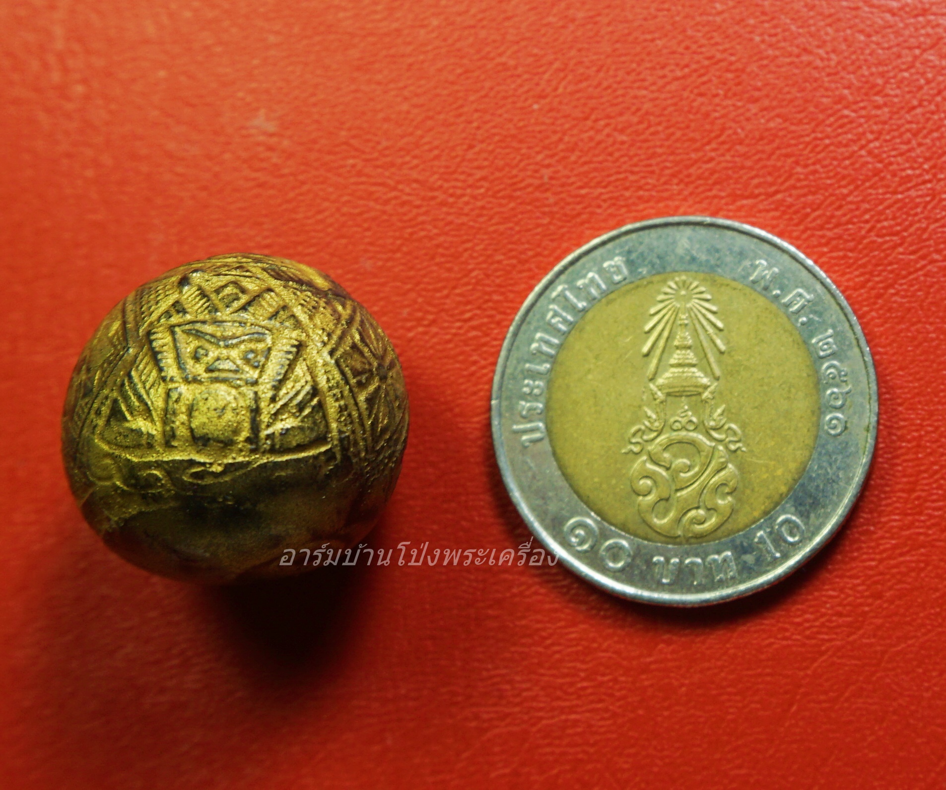 คตมะพร้าวสุดยอดของมงคลศักสิทธิ์ ป้องกันไสยศาสตร์ทุกชนิด เขย่ามีเสียงดัง แกะเป็นรูปราหู 3 หน้า(องค์ที่2)